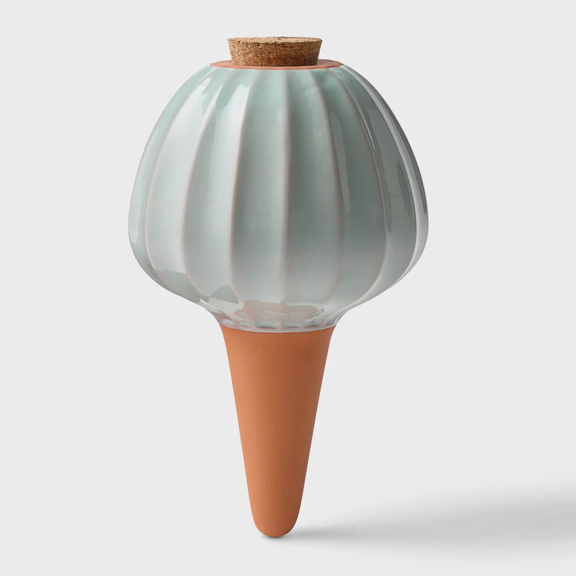 Ceramic bulb-shaped vase with a cork stopper