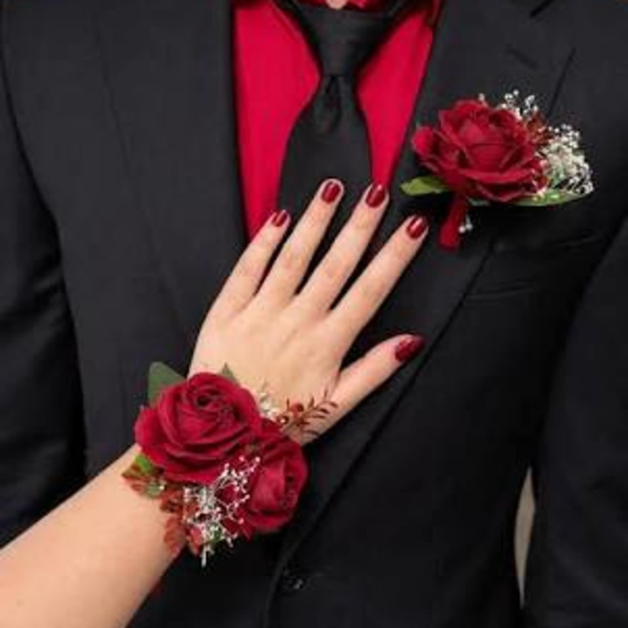 Elegant matching corsage and boutonniere set, perfect for proms, weddings, and special