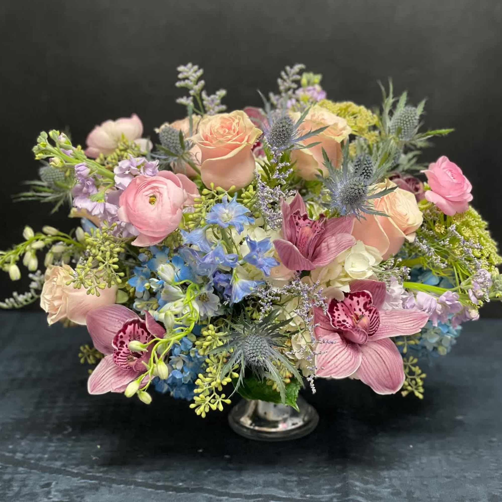 A soft, romantic palette that evokes elegance and tranquility. This arrangement features
