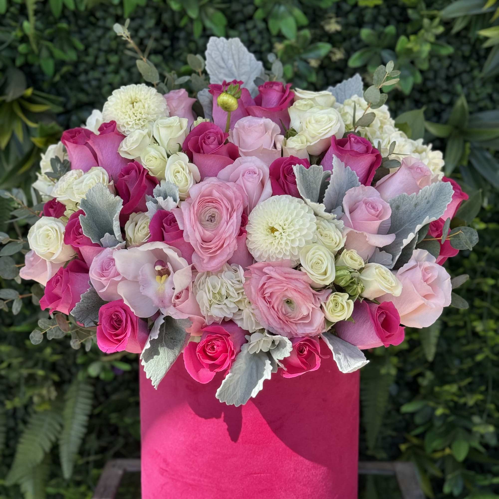 A bright and cheerful arrangement of pink and multicolored blooms, inspired by
