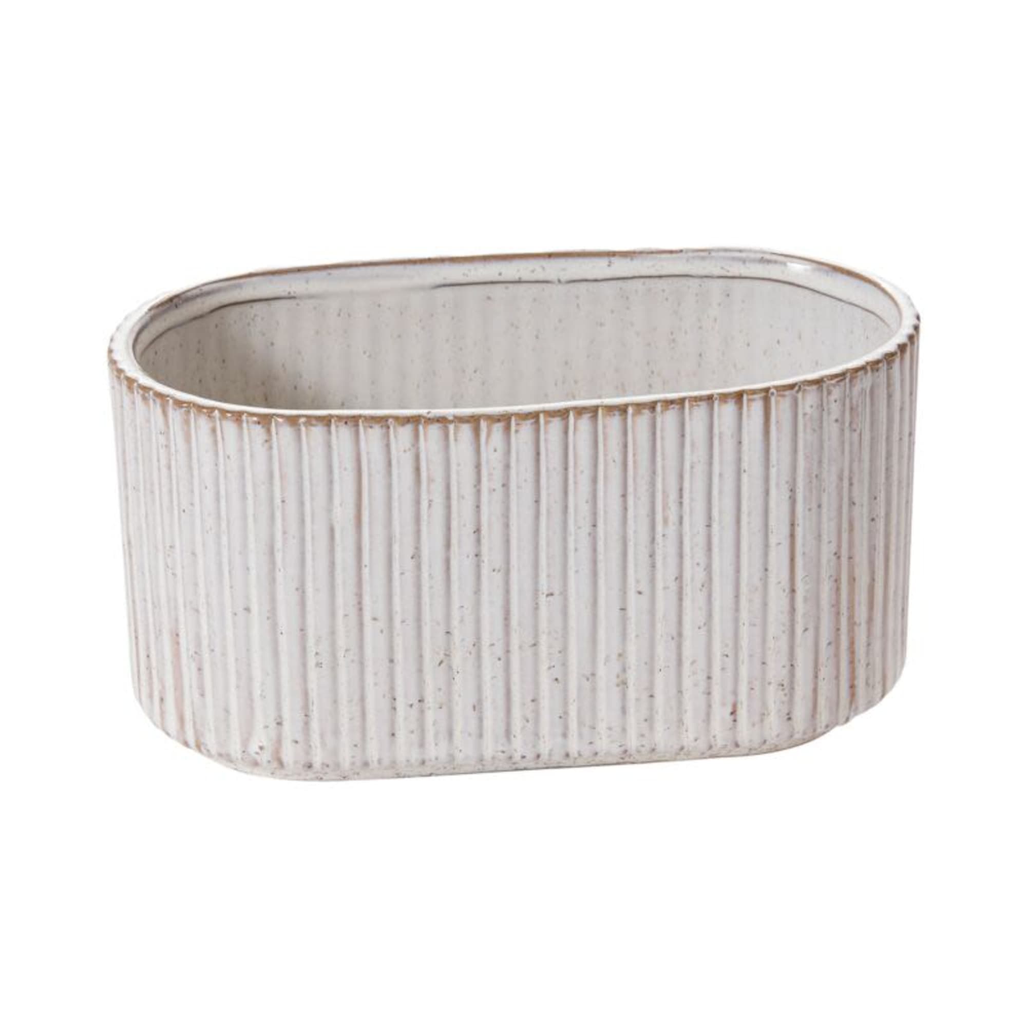 A collection of ribbed ceramic vessels with a soft ivory glaze and