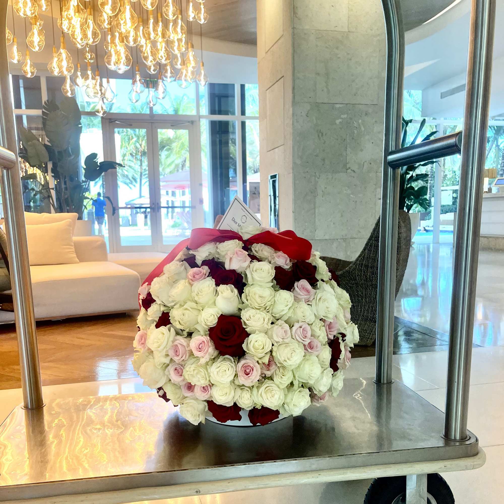 200 Red, Pink and White Roses in a large ceramic vase. , photo 2 of 3