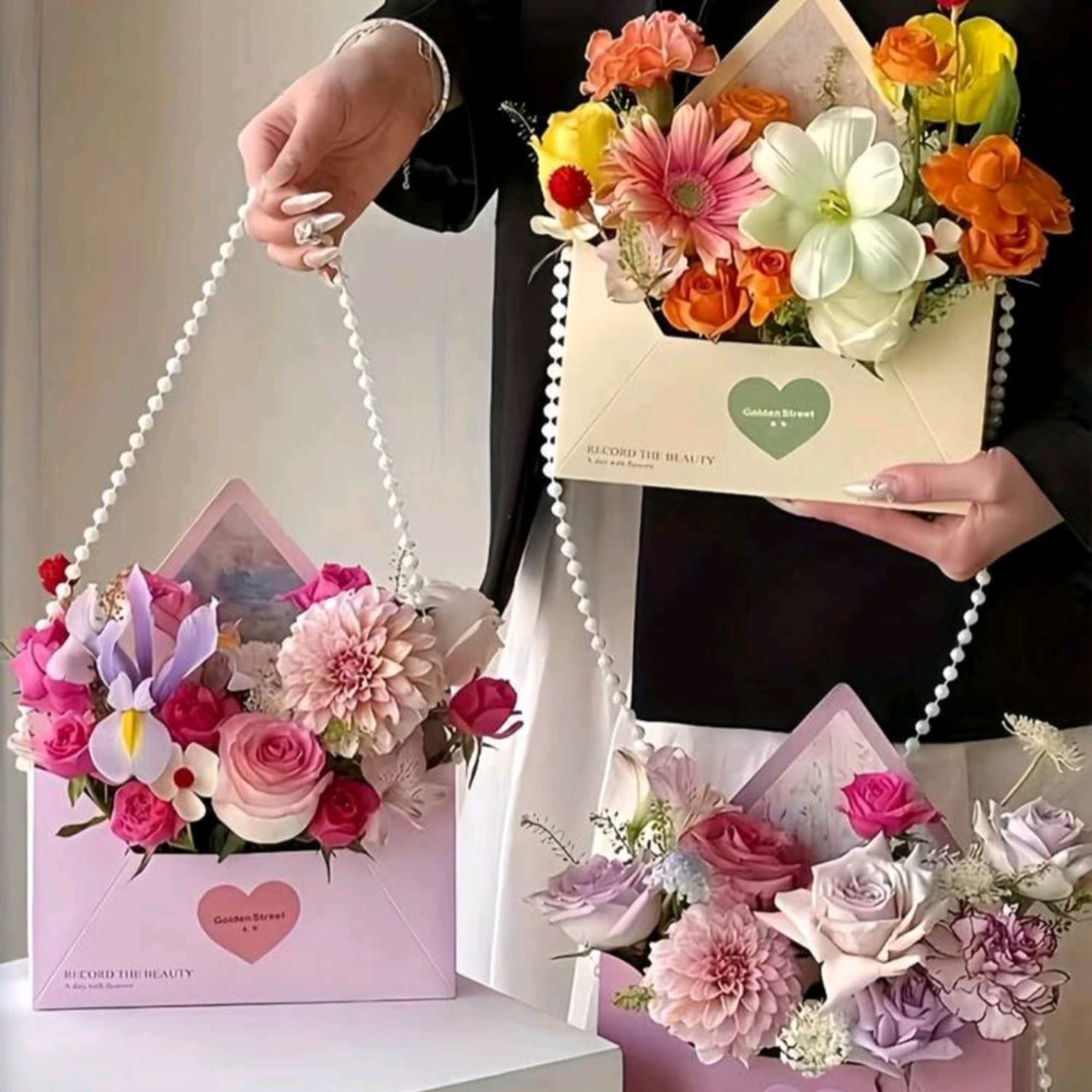 A mixed flowers make this envelope-style arrangement a delight for birthdays, anniversaries