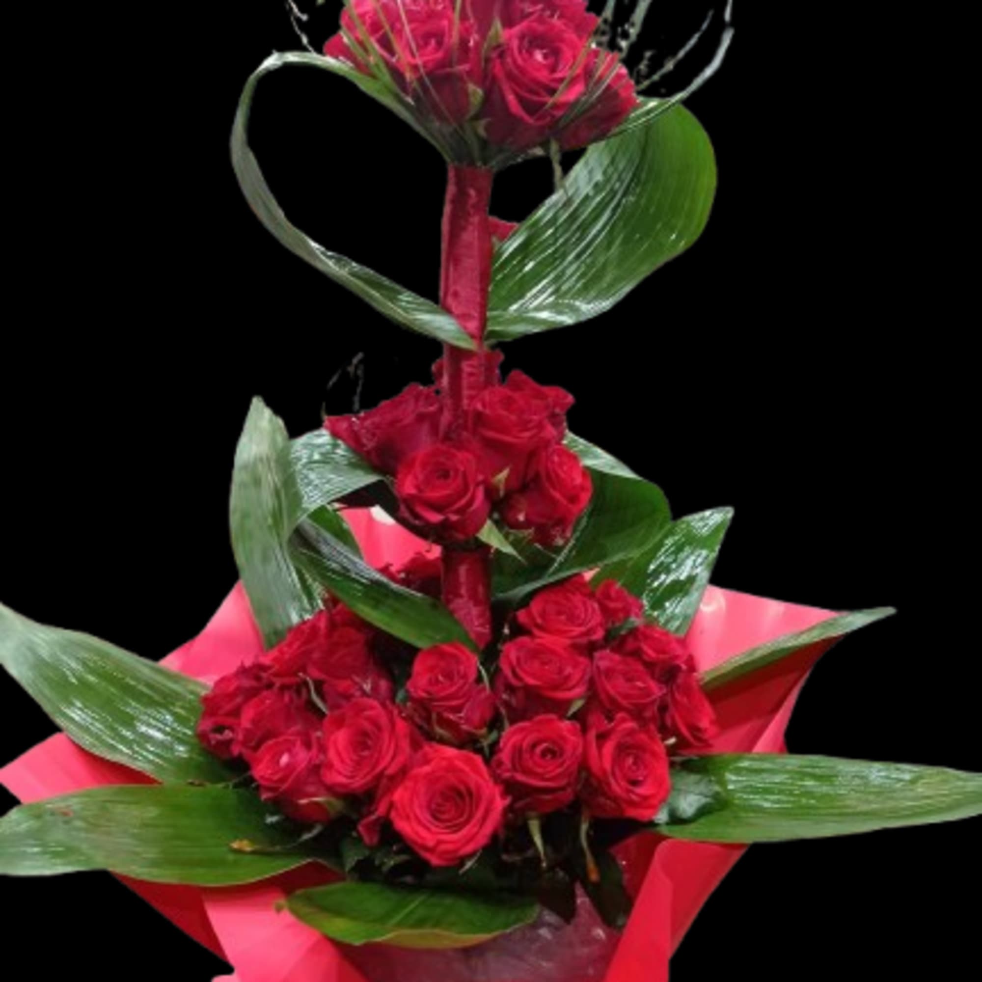A dramatic, sculptural rose arrangement that reads as a bold romantic statement