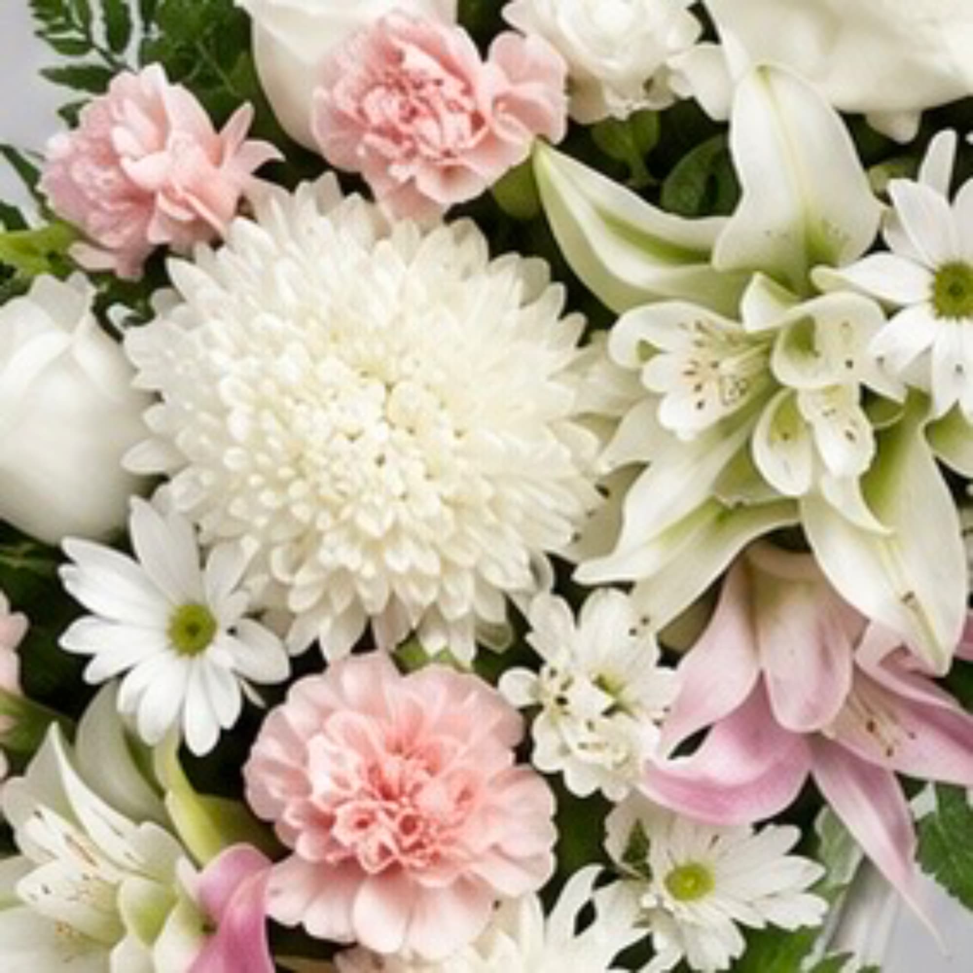 White and pale pink mixed bouquet with daisies and lilies