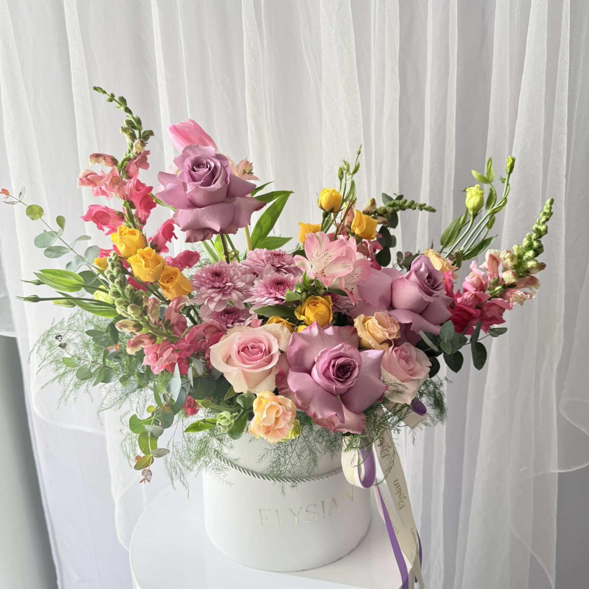 A joyful blend of color, texture, and movement &mdash; this garden-inspired arrangement, photo 2 of 3