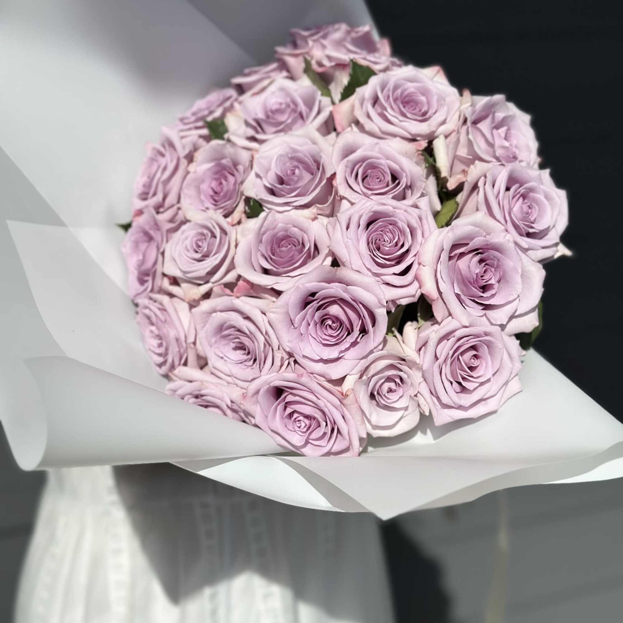Purple roses symbolize enchantment and love at first sight &mdash; making them, photo 2 of 3
