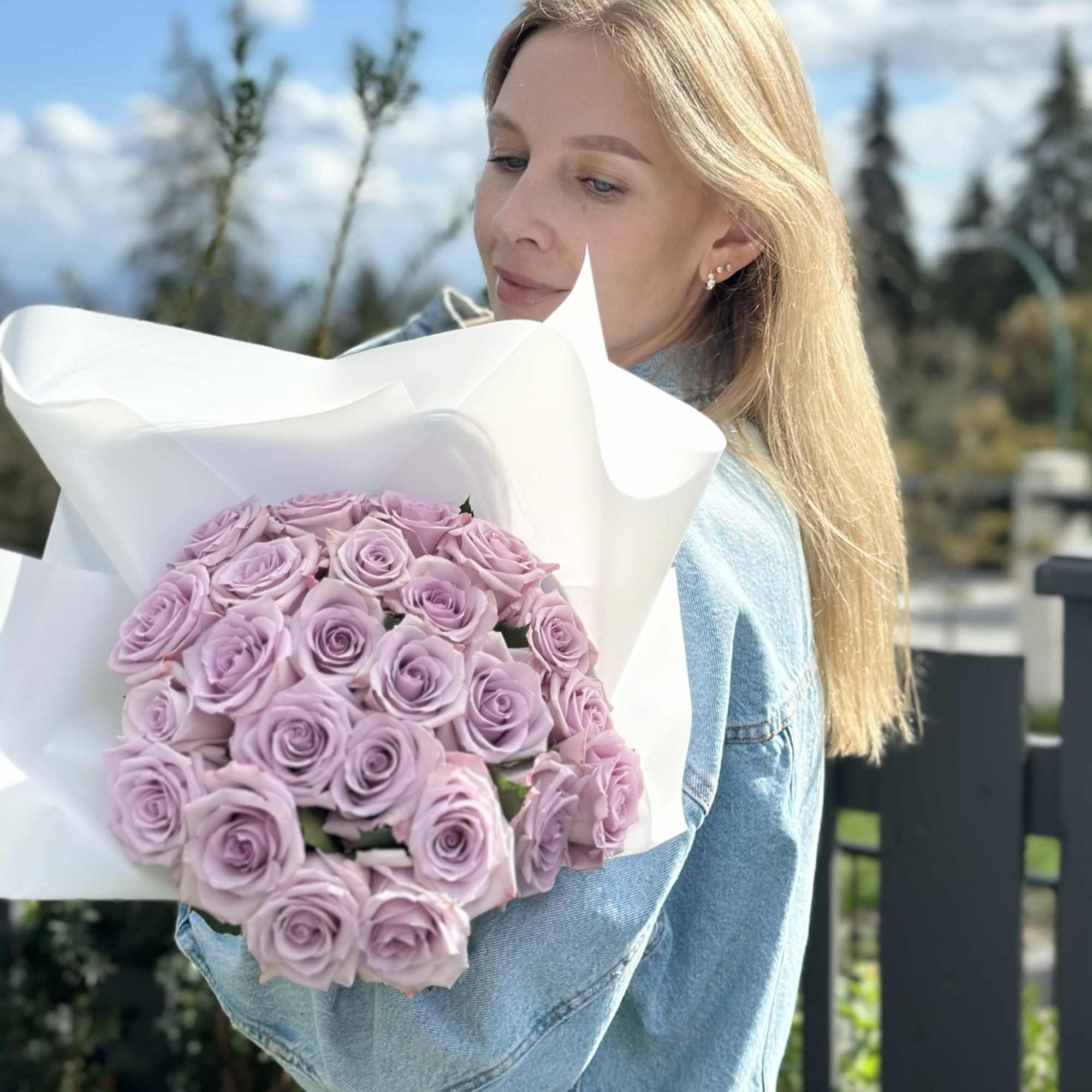Purple roses symbolize enchantment and love at first sight &mdash; making them, photo 3 of 3