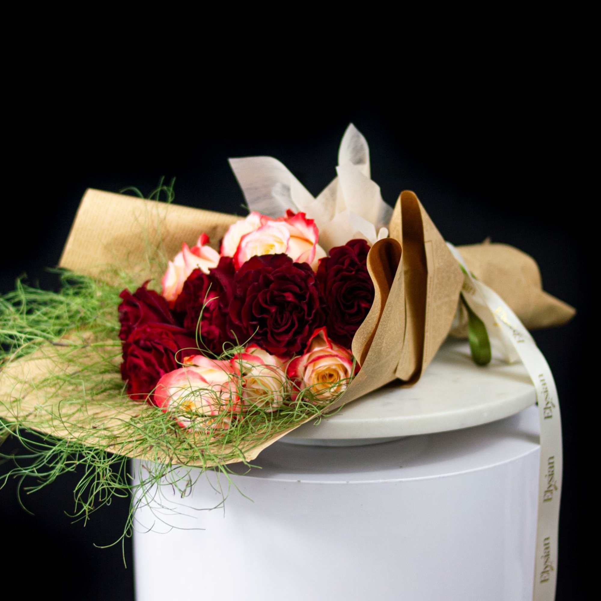 Bold, dramatic, and irresistibly romantic. Crimson Muse is a striking bouquet featuring