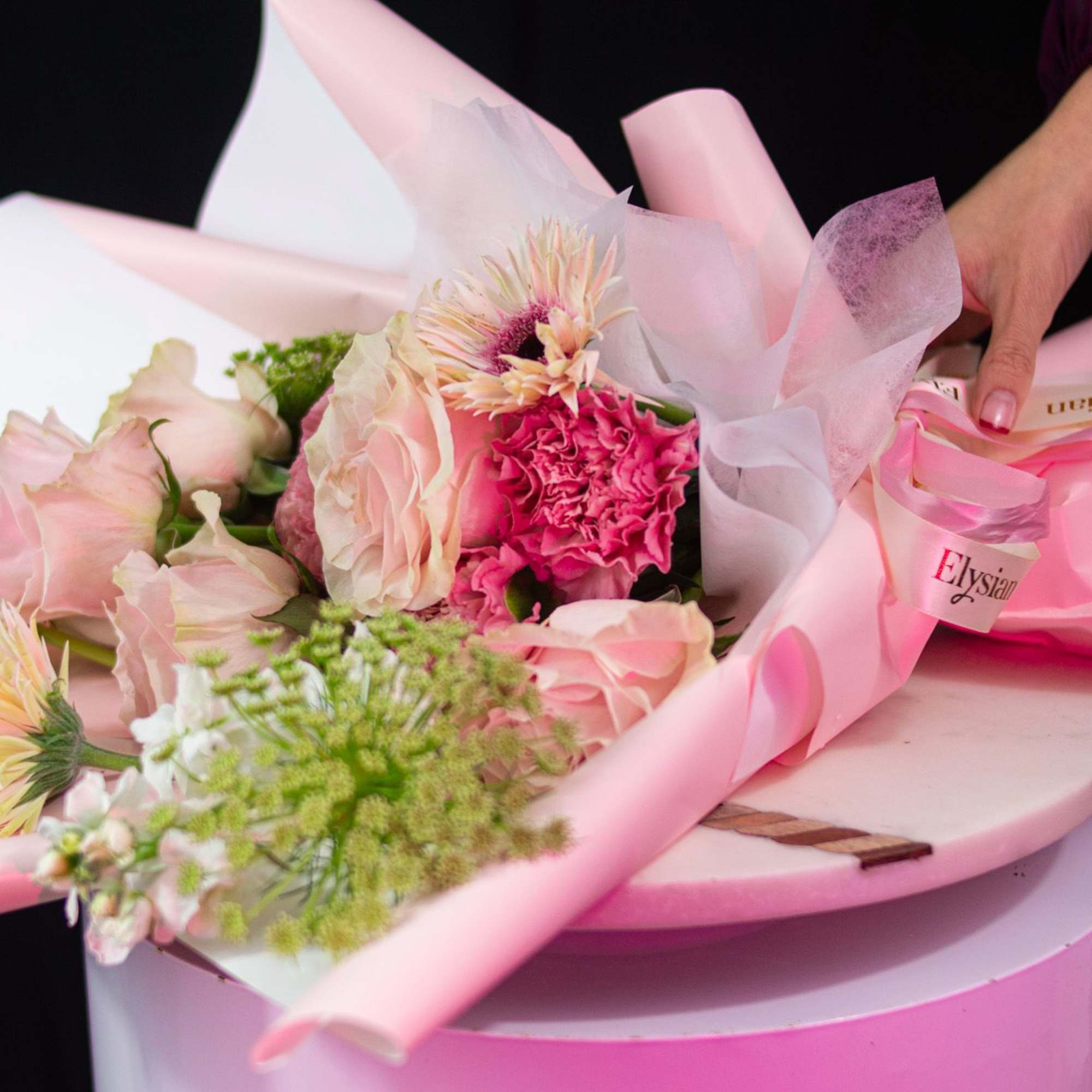 A soft expression of love, redefined. This arrangement features blush and nude