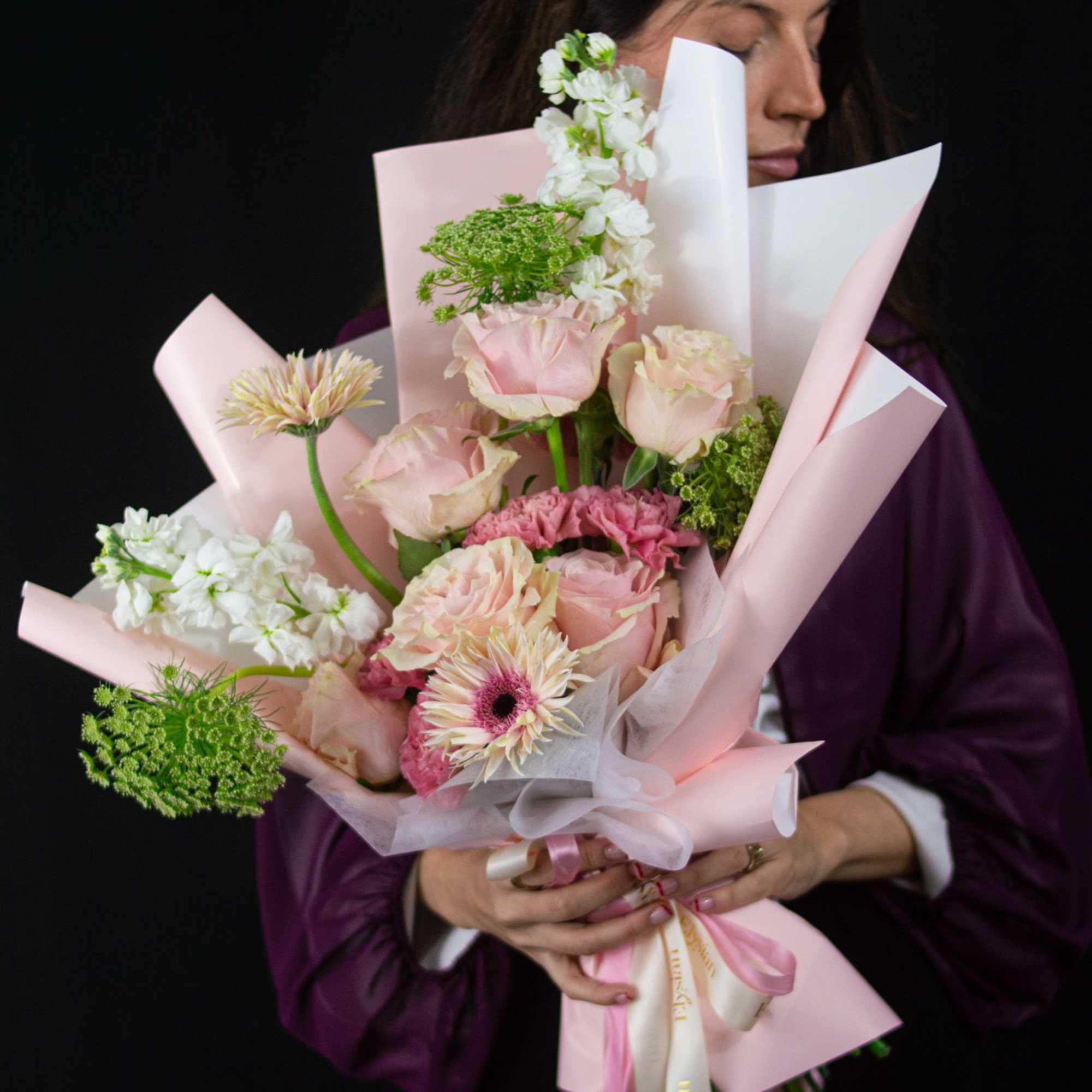 A soft expression of love, redefined. This arrangement features blush and nude