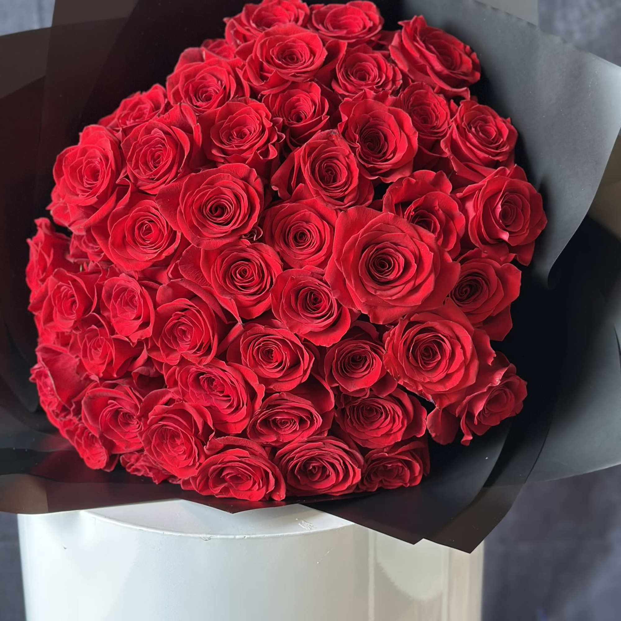 Say it all with this gorgeous bouquet of 50 fresh Ecuadorian roses