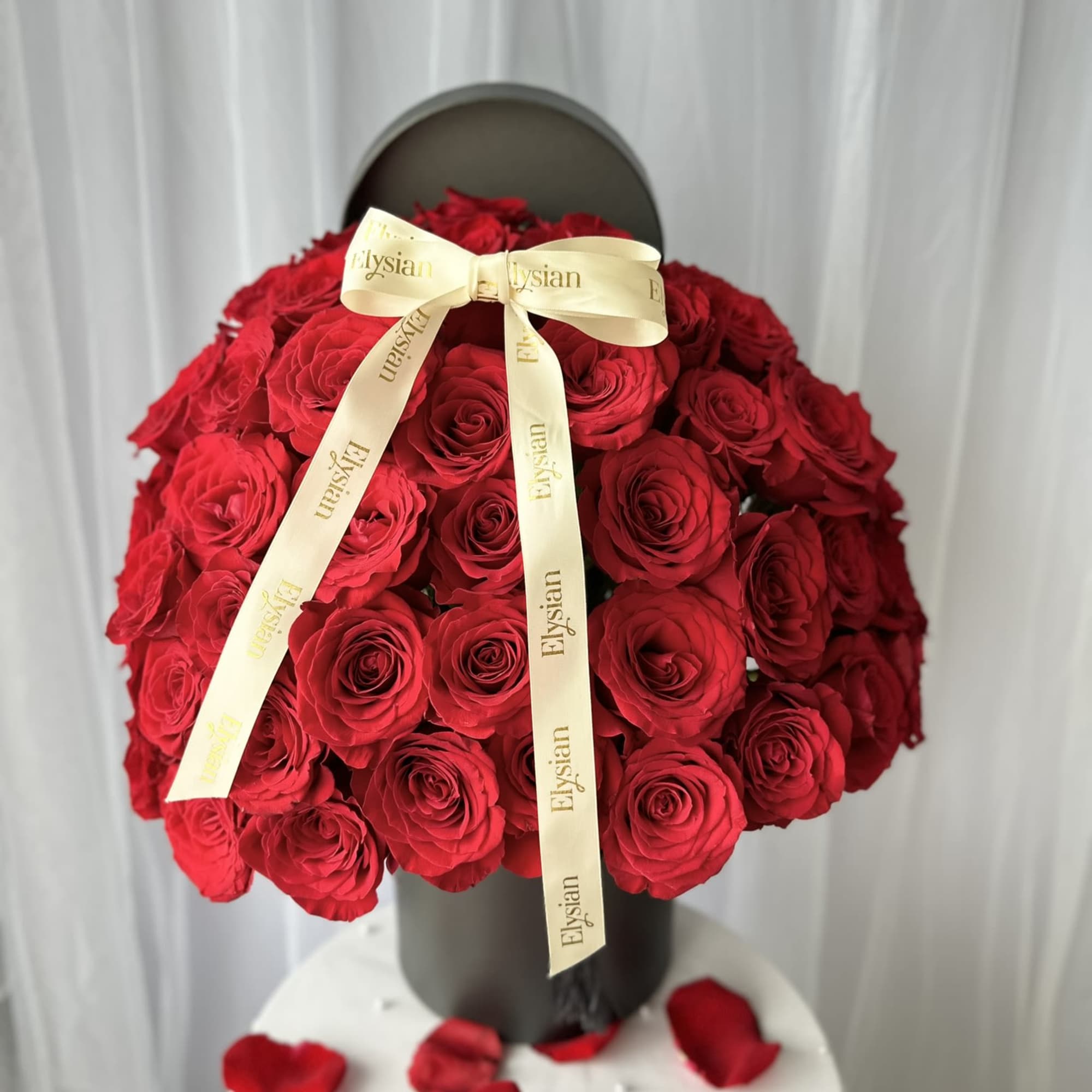 Introducing Grand Symphony of Roses, an opulent flower box arrangement designed to
