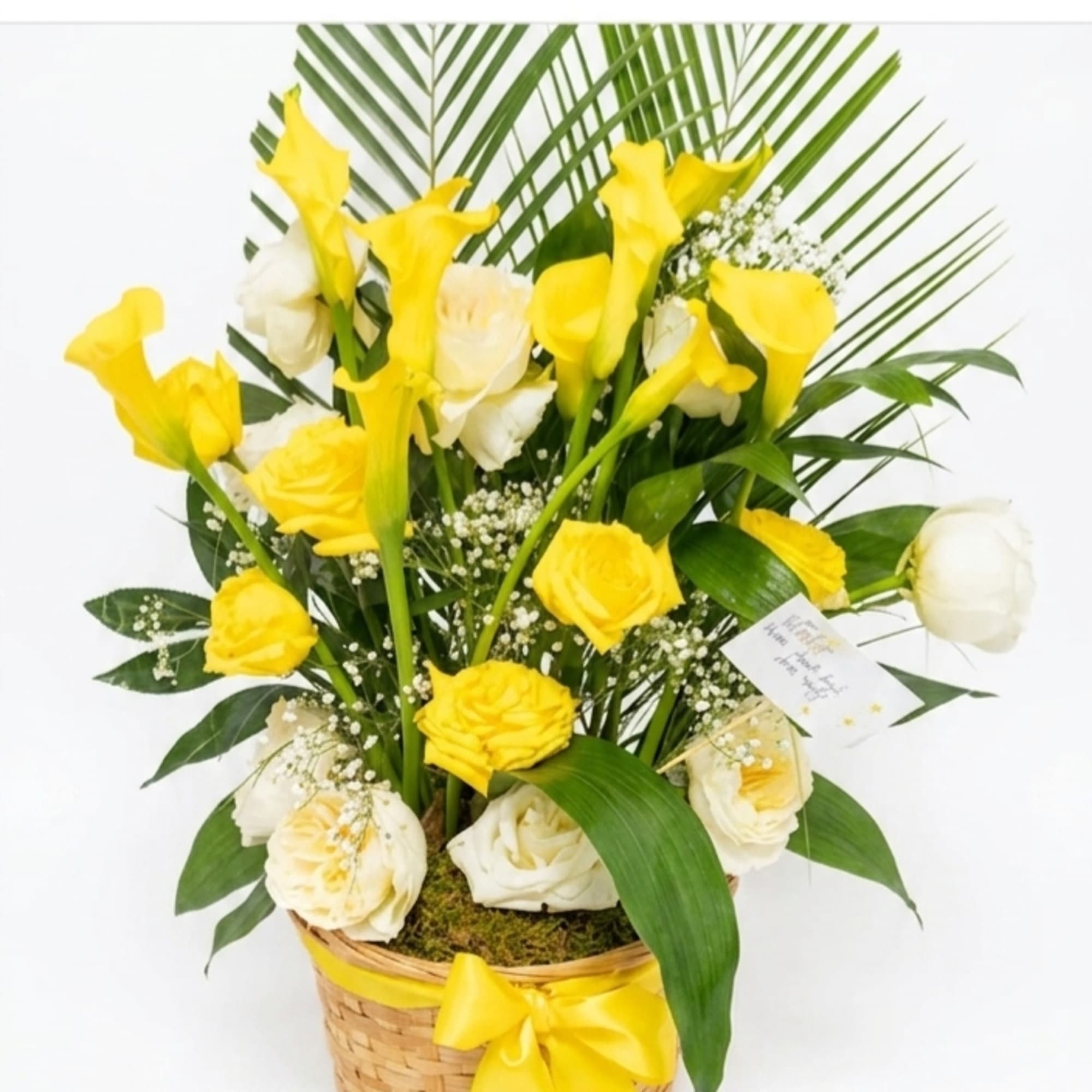 Sunlit yellow calla lilies and sunny yellow-and-white roses create an uplifting birthday