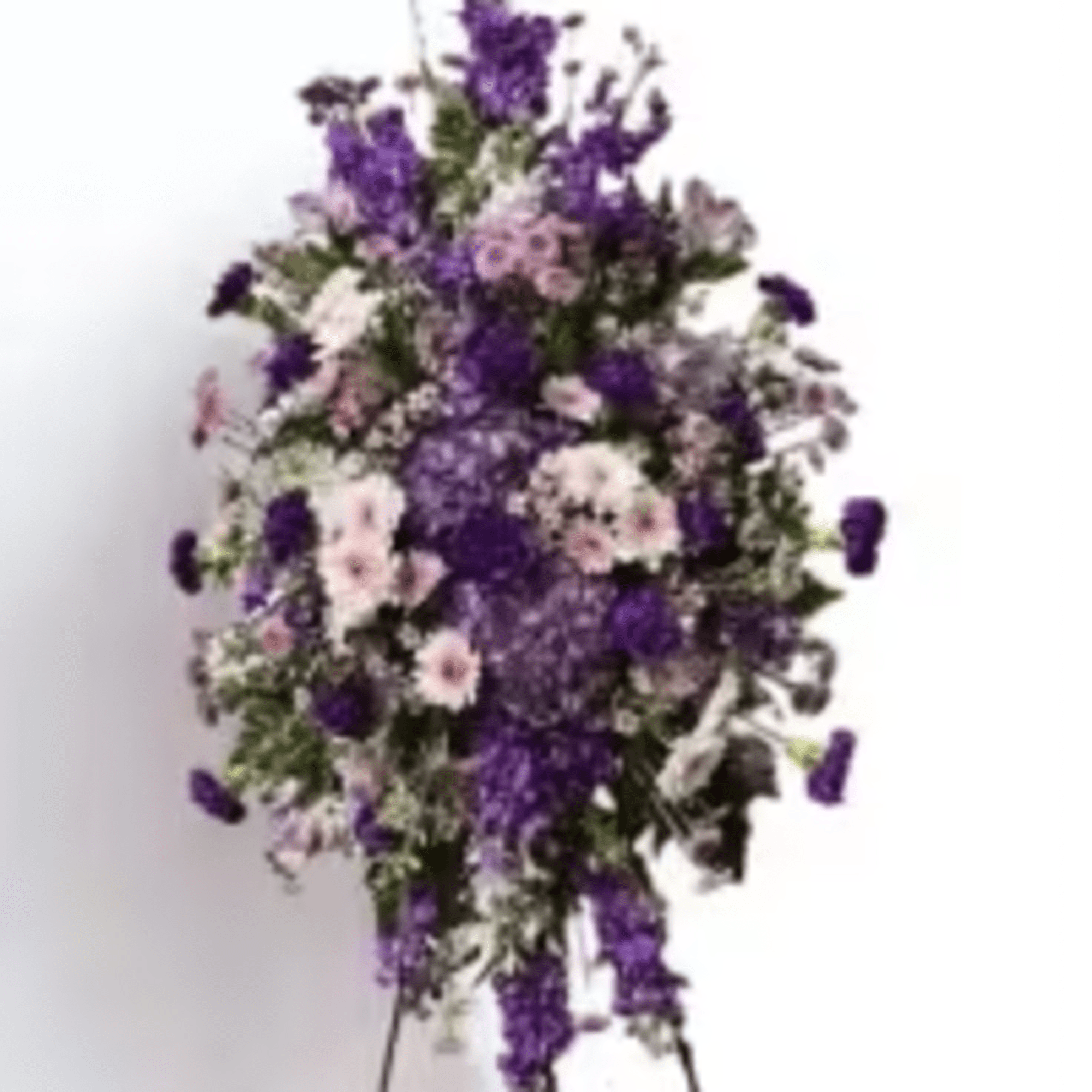 Amethyst Mist is a tall standing spray designed for sympathy and memorial