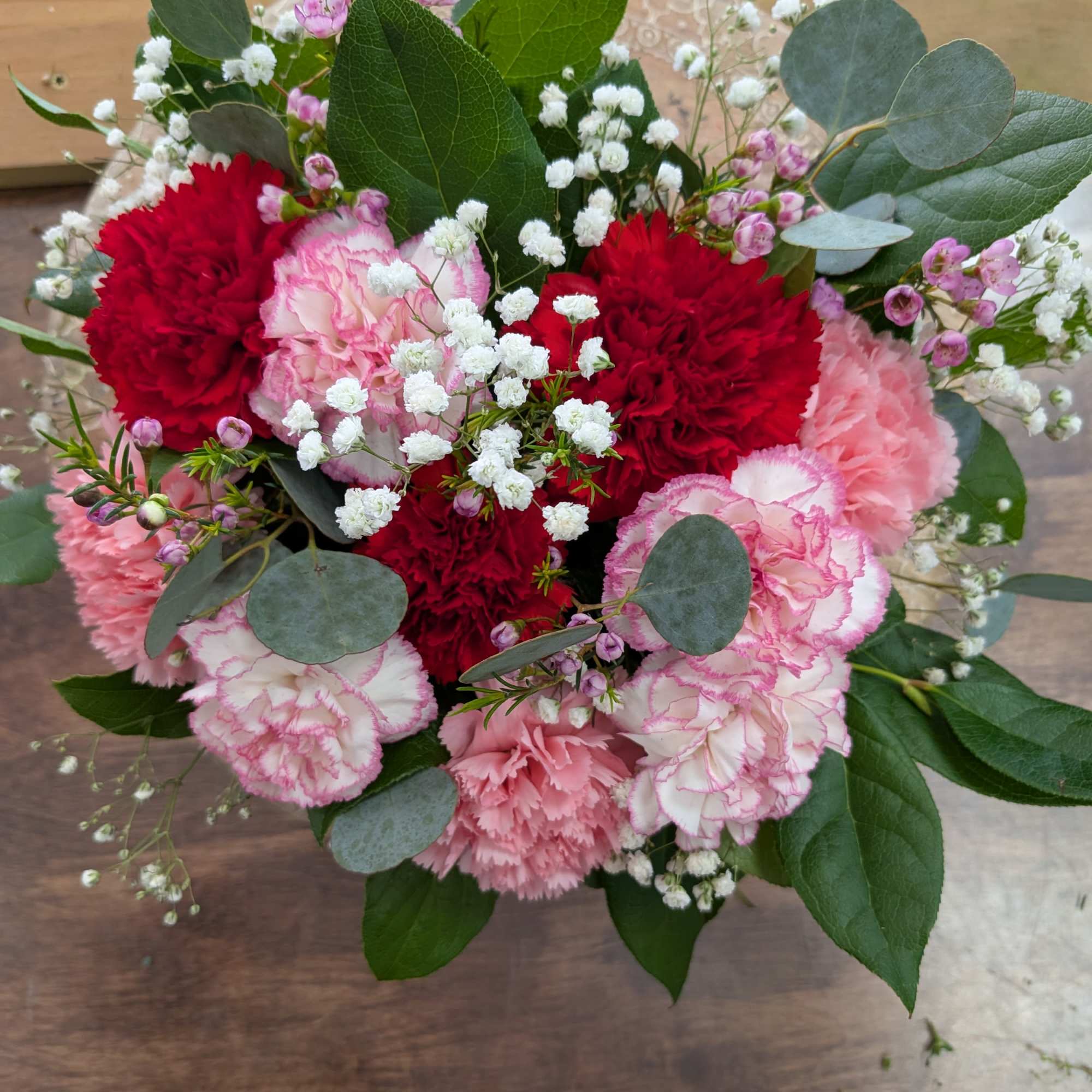 Variety of carnation and greens, photo 2 of 2