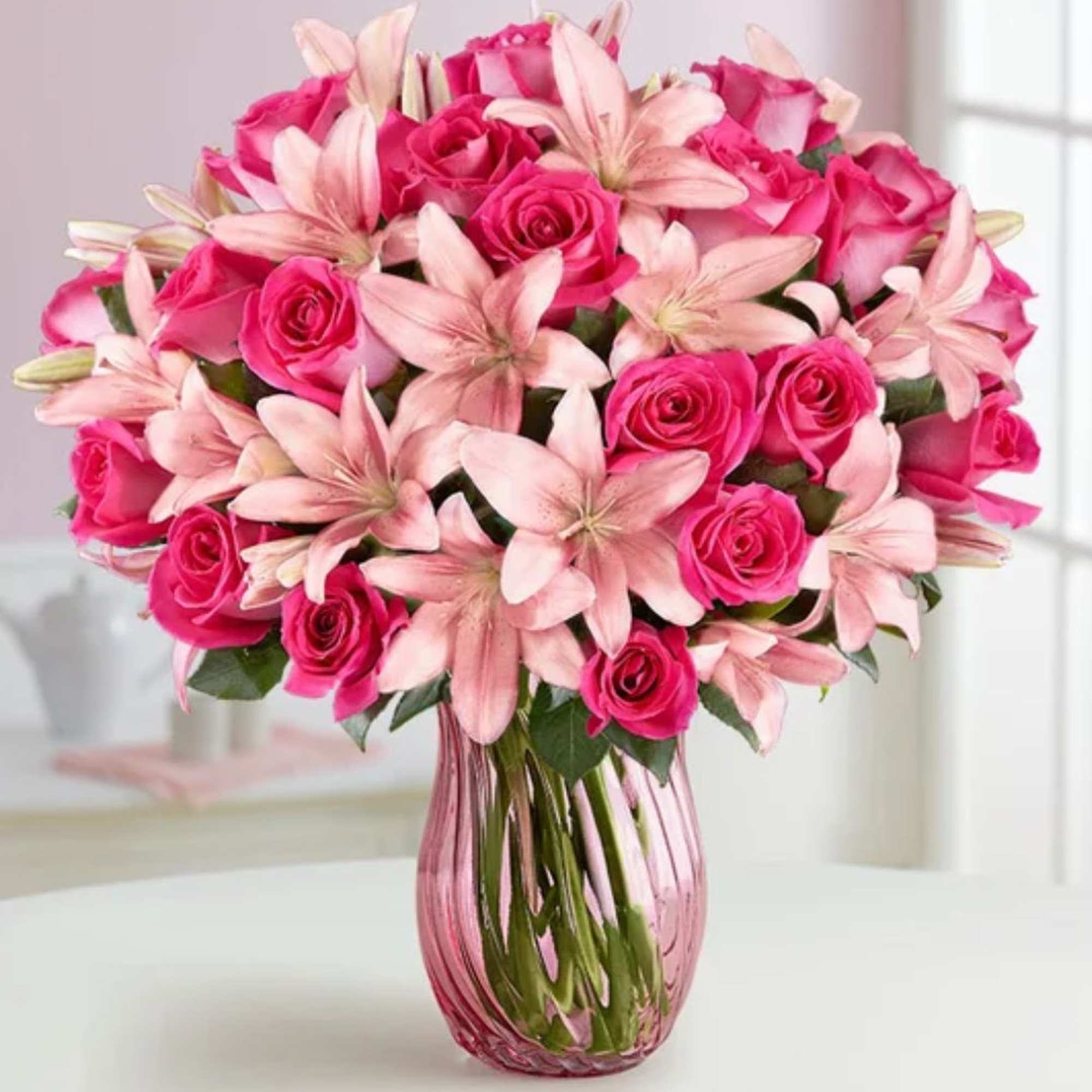 The Blushing Beauty Bouquet is a stunning celebration of softness, joy, and