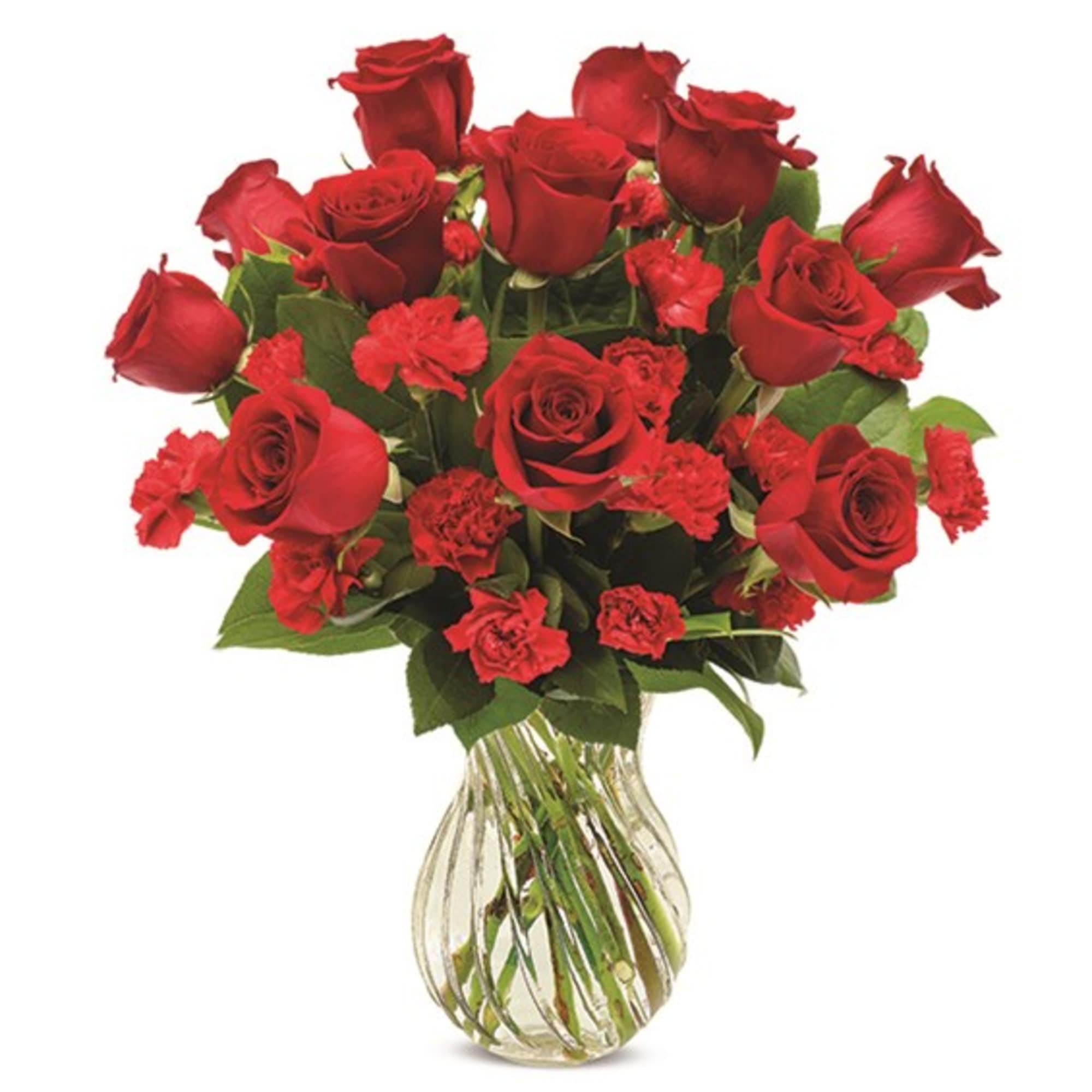 Red roses and carnations arranged in a clear glass vase