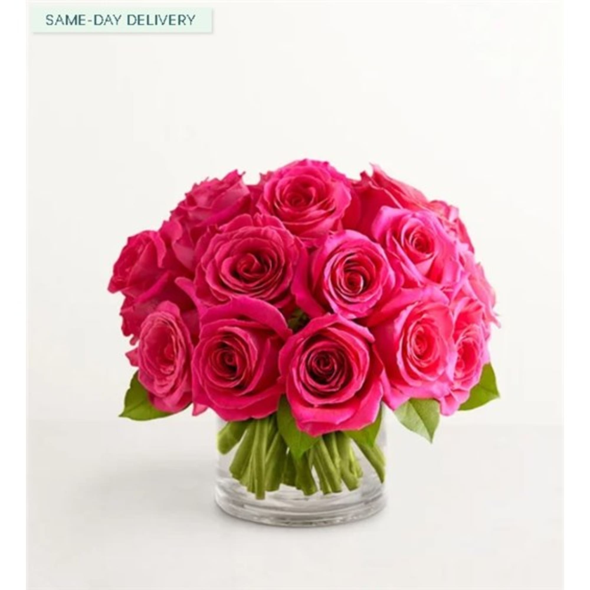Pink rose bouquet in a clear glass vase