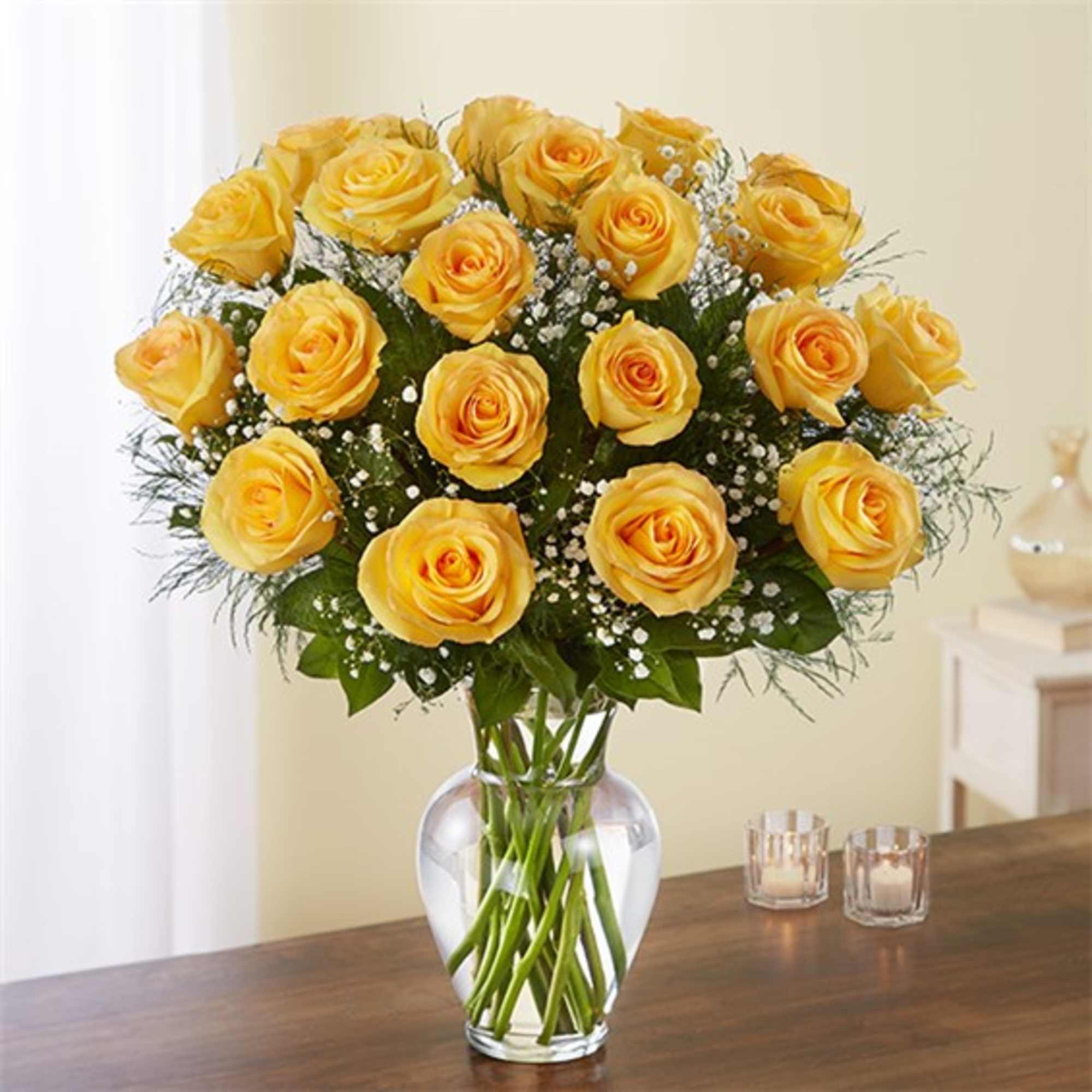 Bouquet of yellow roses in a clear glass vase