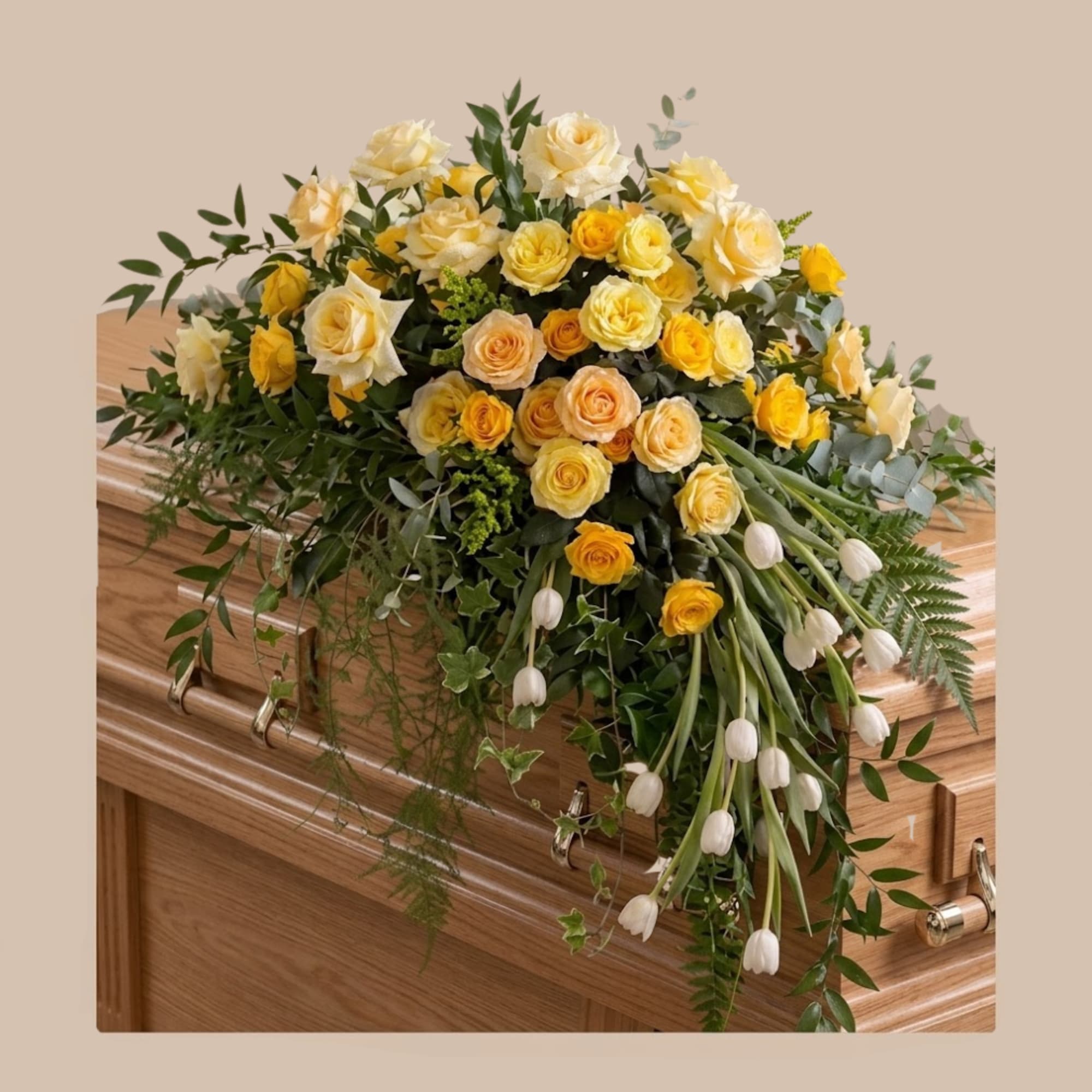 A generous casket spray crafted to convey warmth and gentle comfort, perfect