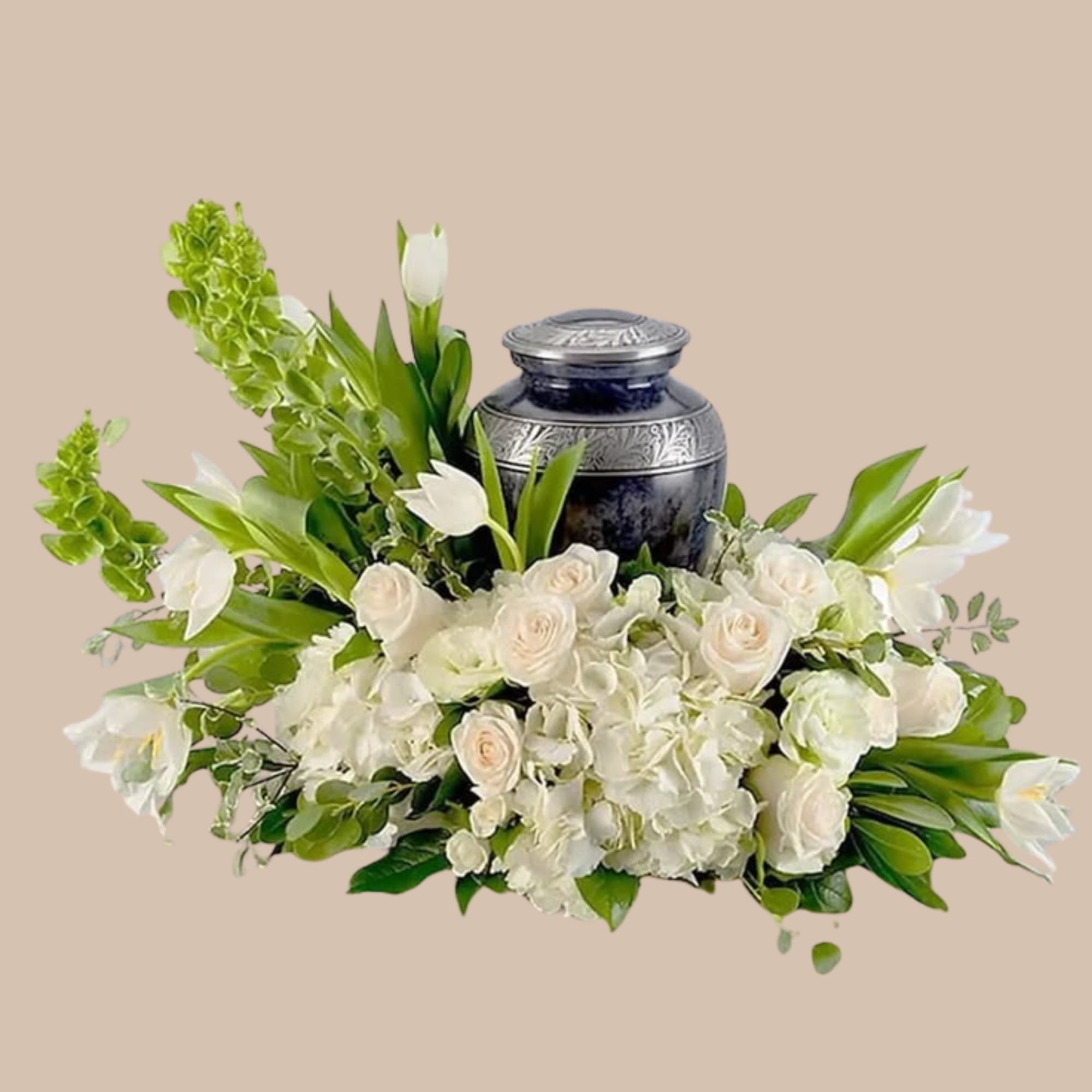 A serene cluster of white roses, hydrangeas, and lilies forms the centerpiece