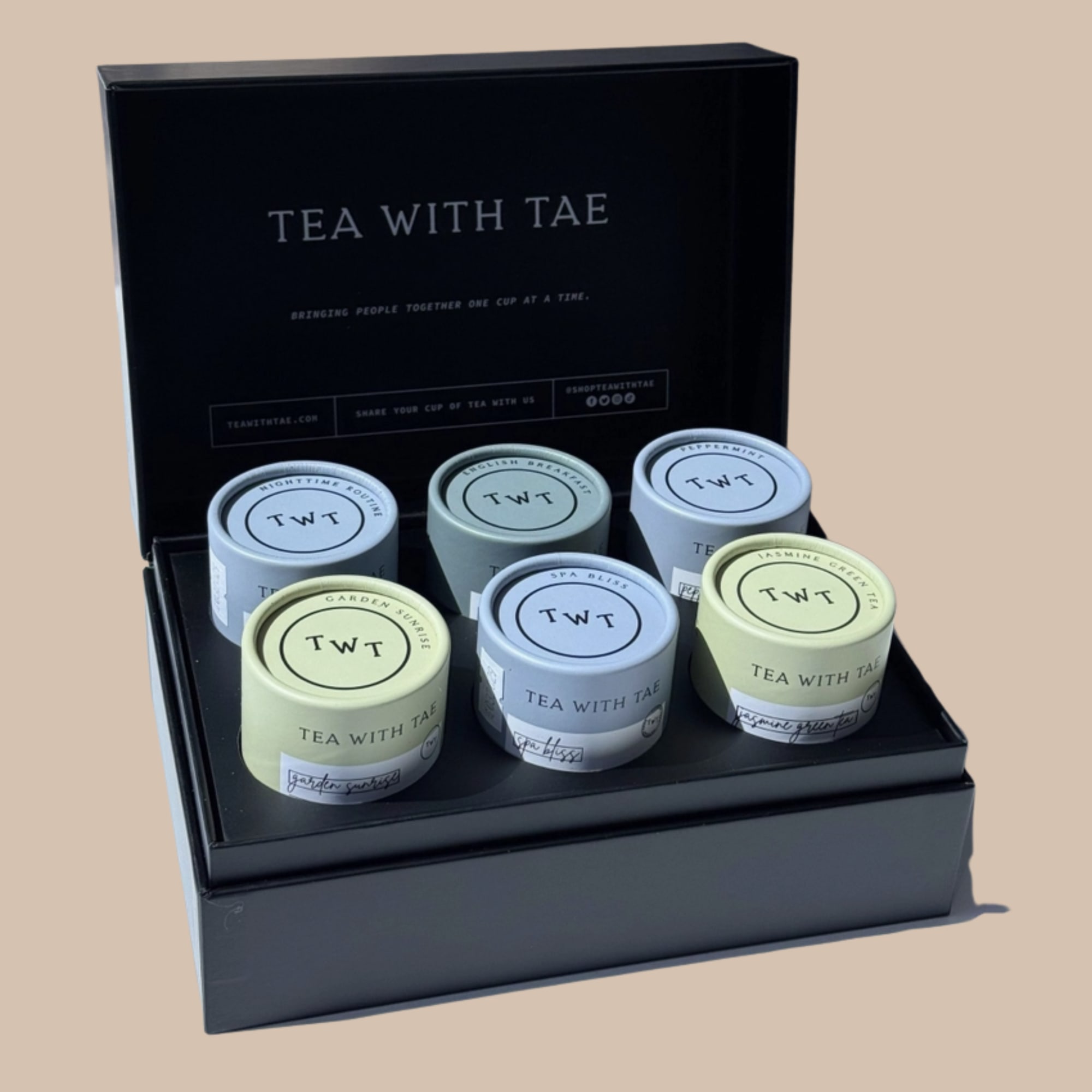 A matte black presentation box of premium teas makes a calm, modern, photo 2 of 5
