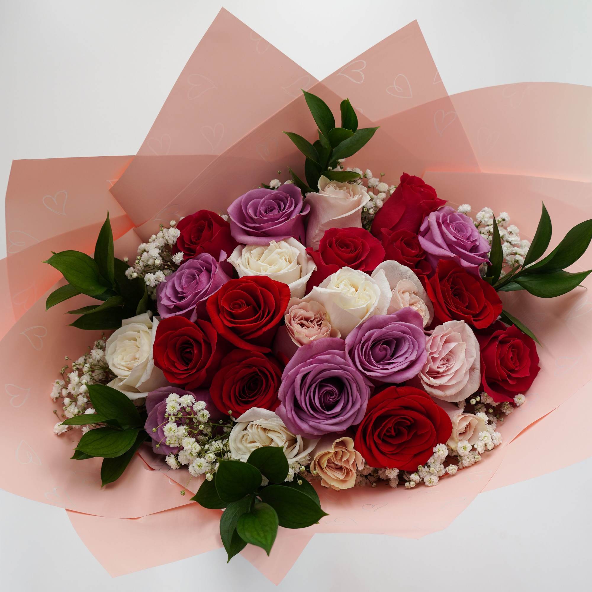 A beautiful mix of red, lavender, white, pink and hot pink roses, photo 2 of 2