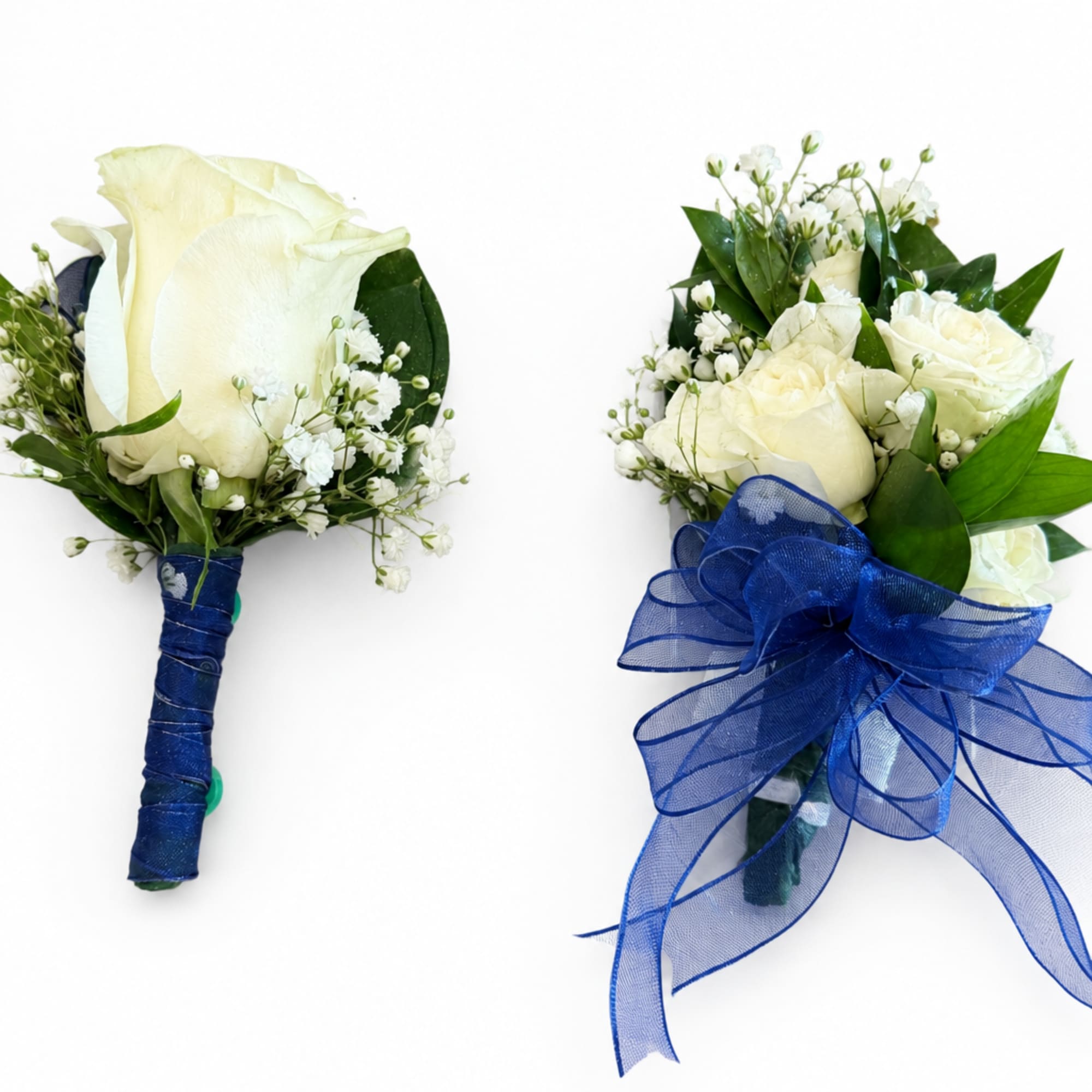 White rose boutonnieres with baby's breath and blue ribbon wrap