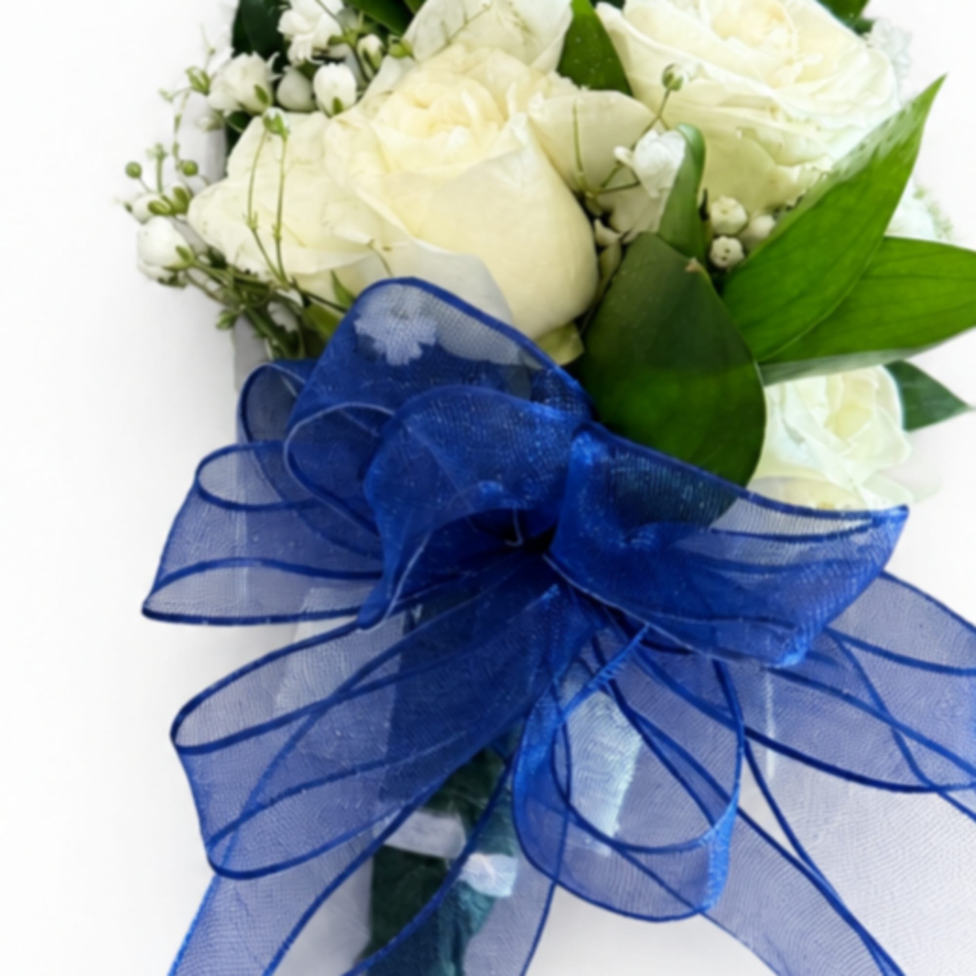 White rose bouquet with a large blue ribbon bow