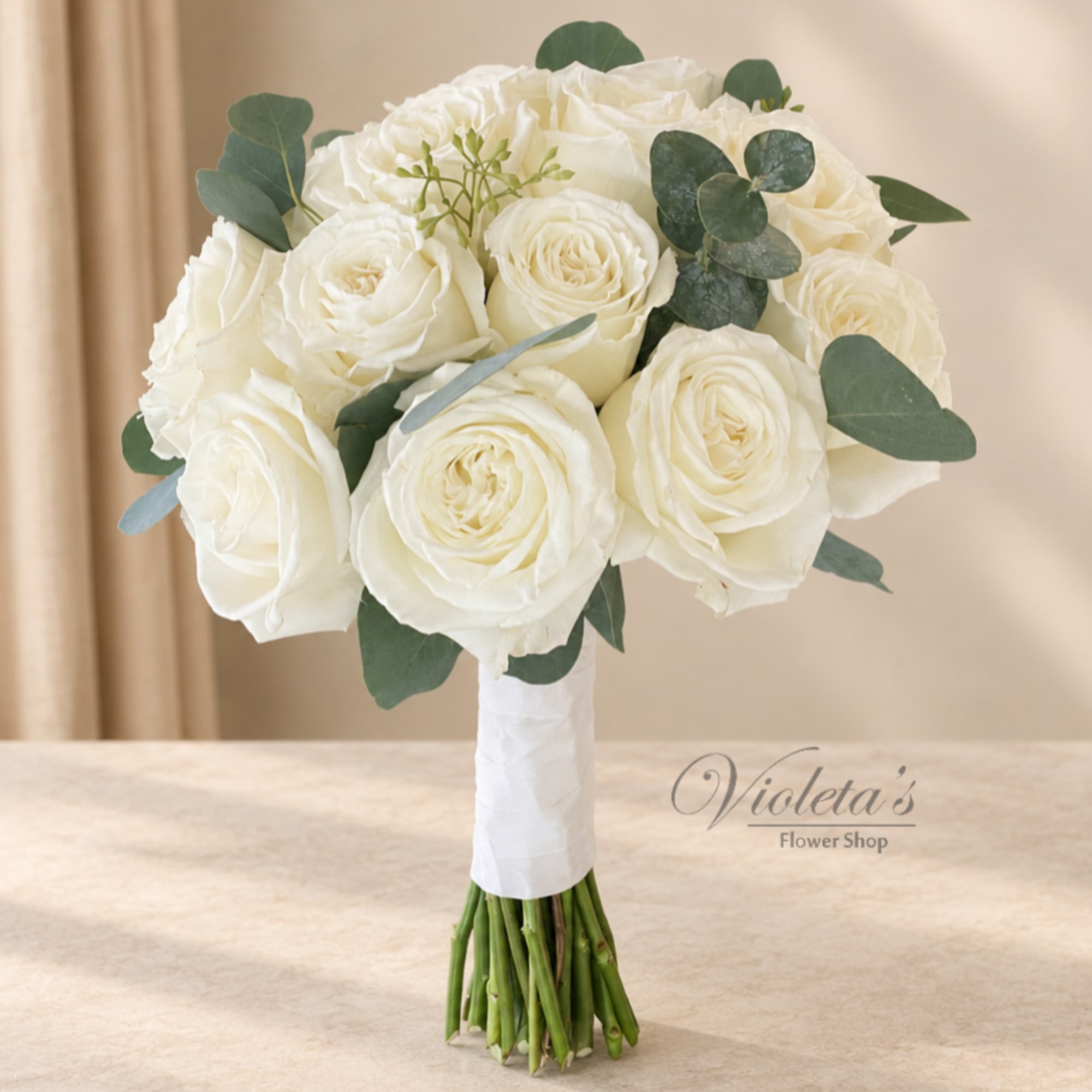 White rose bridal bouquet with eucalyptus greenery