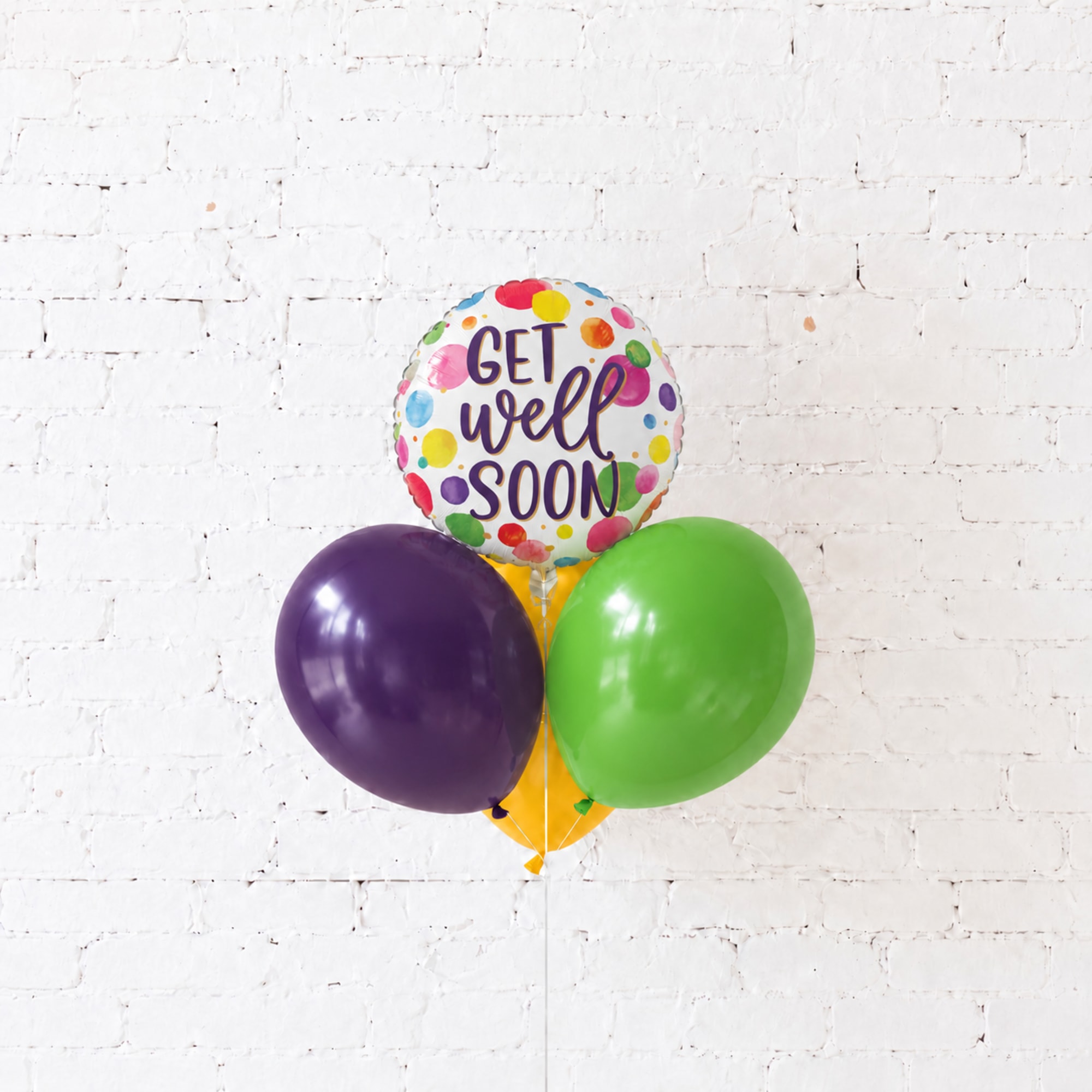 Get well soon balloon bouquet with purple and green balloons