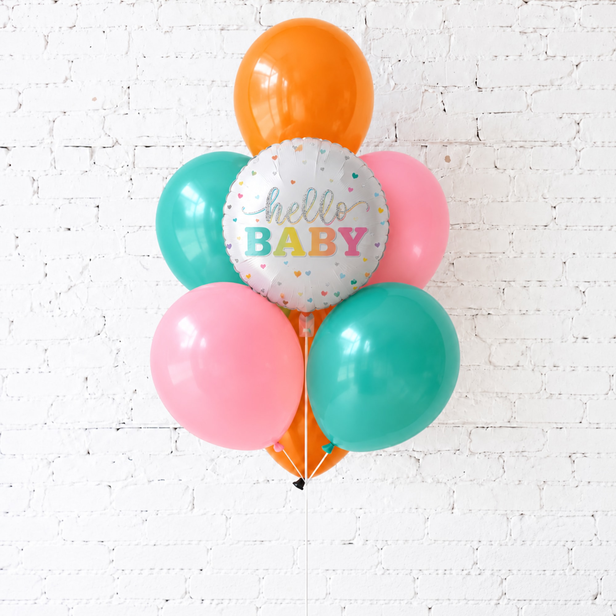 Cluster of pastel balloons with a "hello BABY" foil balloon