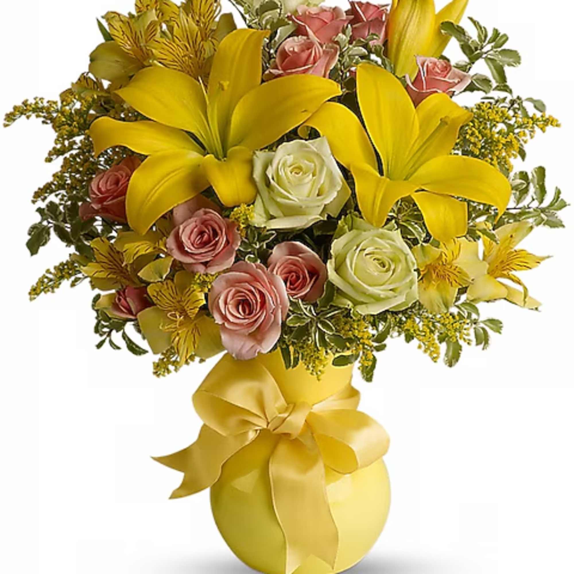Yellow lilies and pink roses in a yellow vase with a ribbon