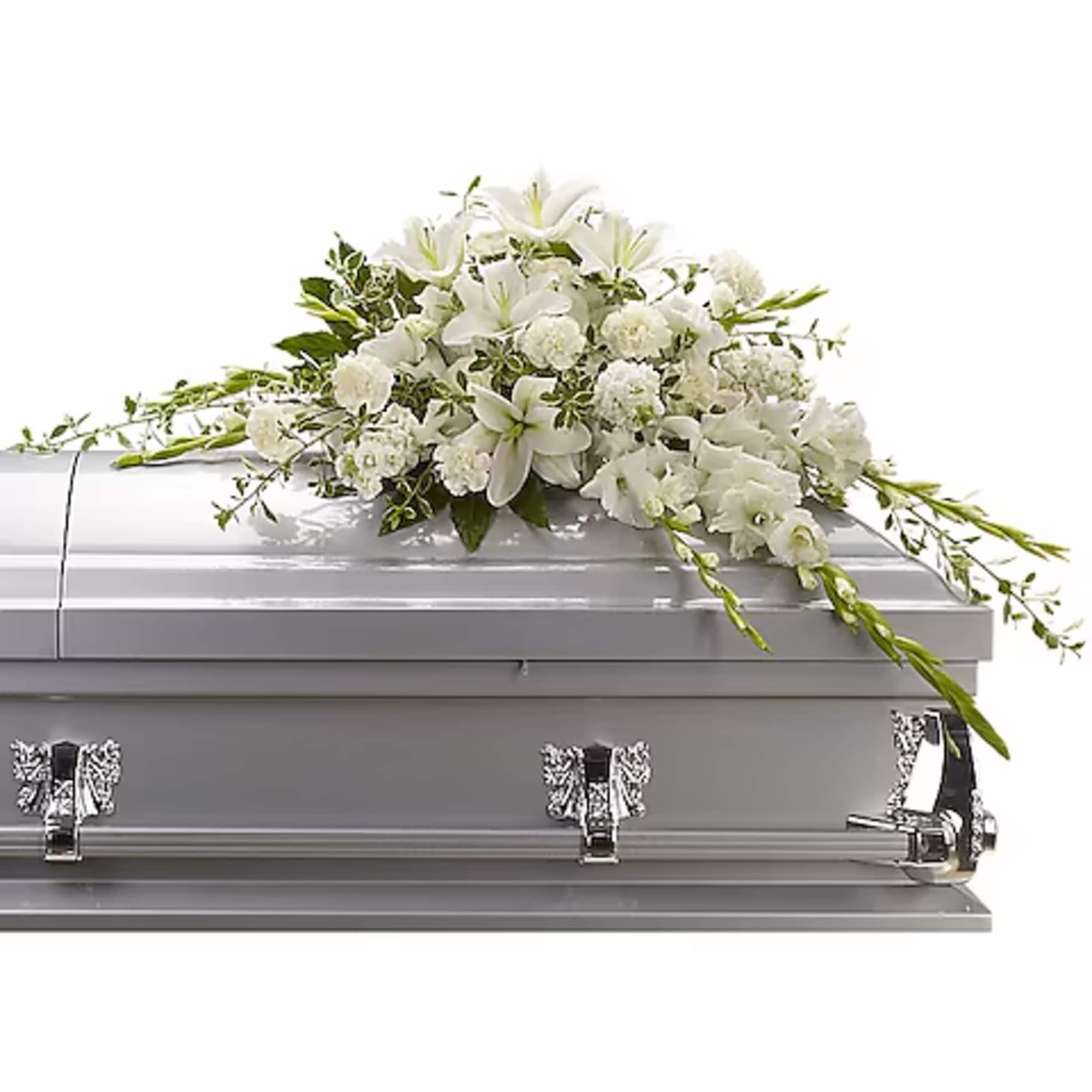 White floral spray on a silver casket