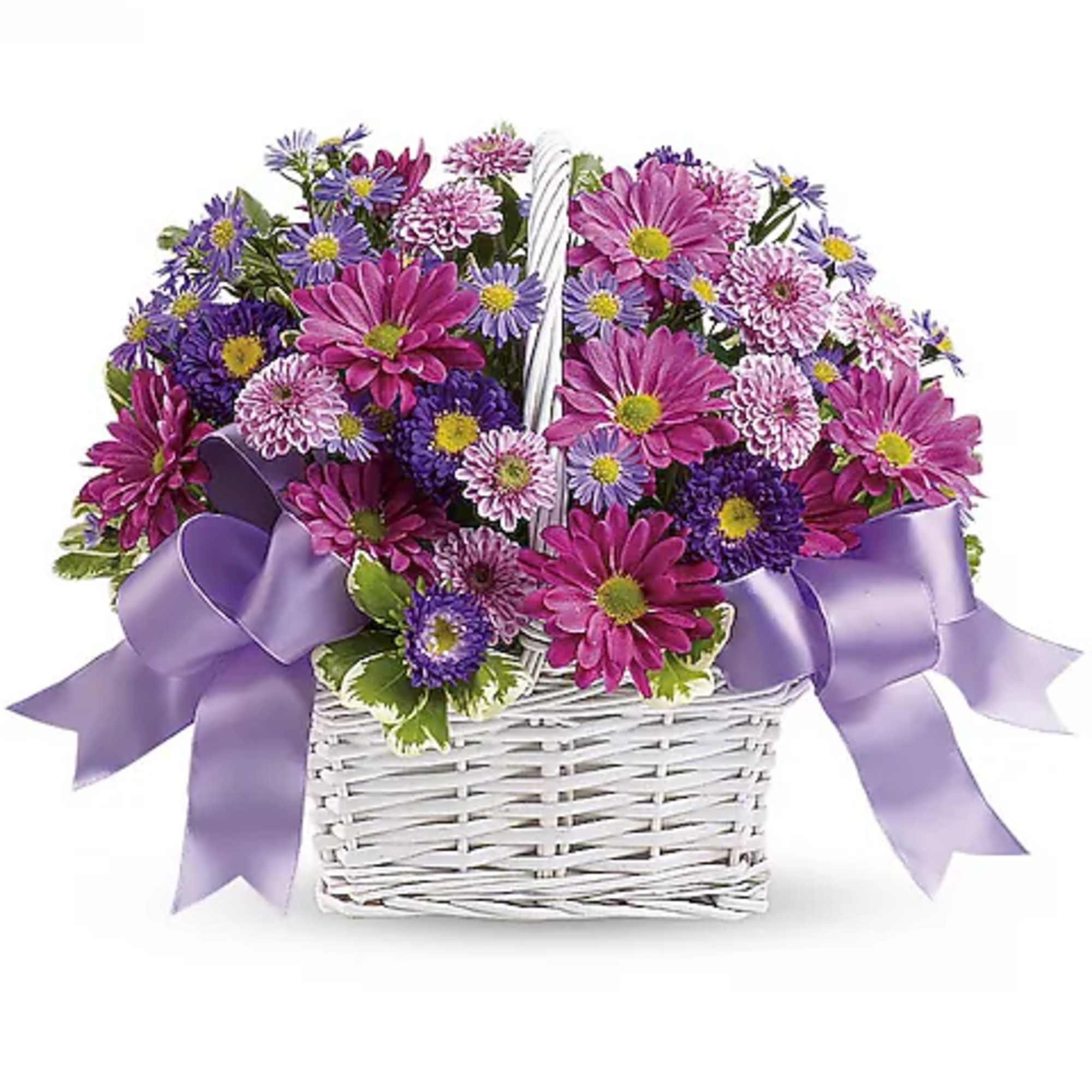 Purple and pink mixed flowers in a white wicker basket with lavender ribbon