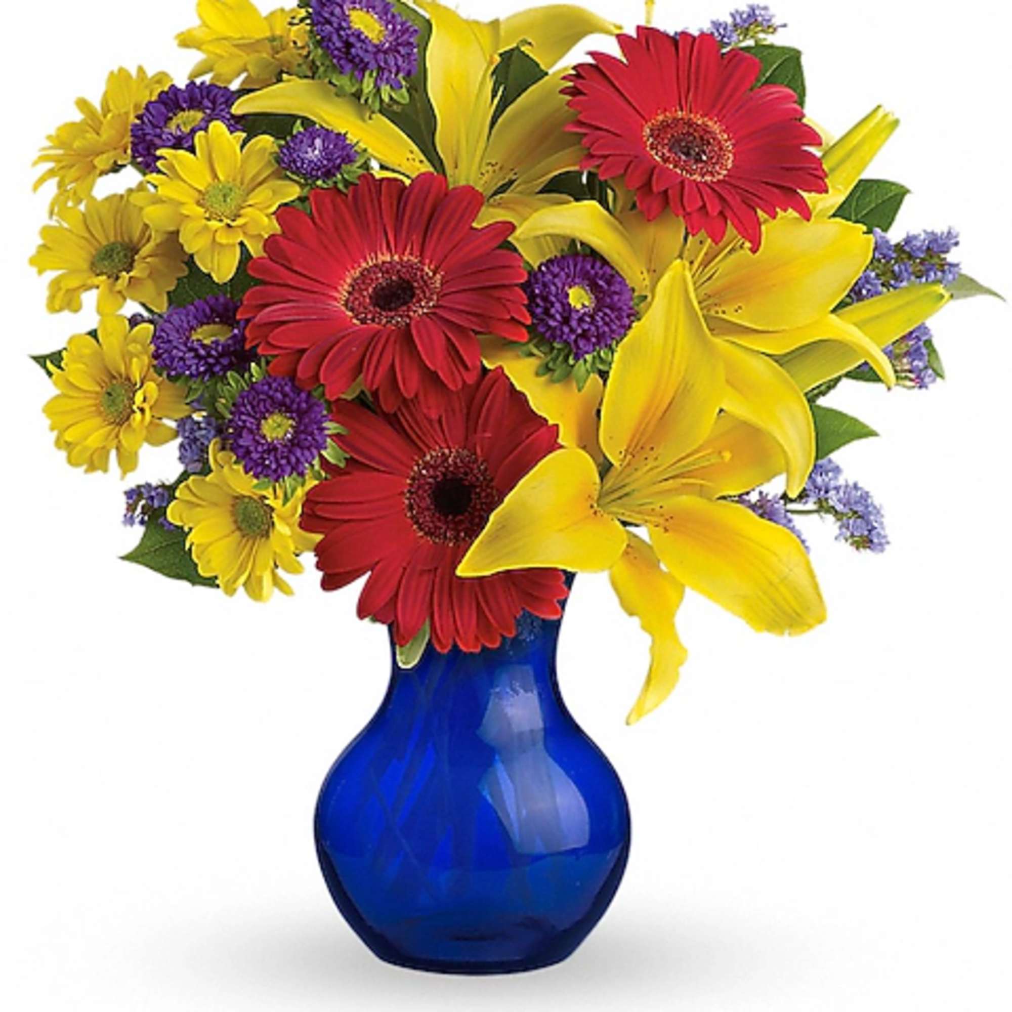 Bouquet of red gerbera daisies and yellow lilies in a blue vase