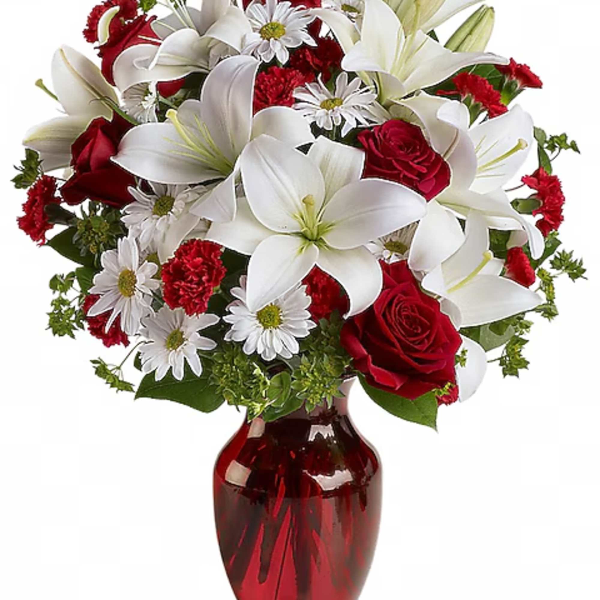 Red roses, white lilies, and daisies in a red glass vase