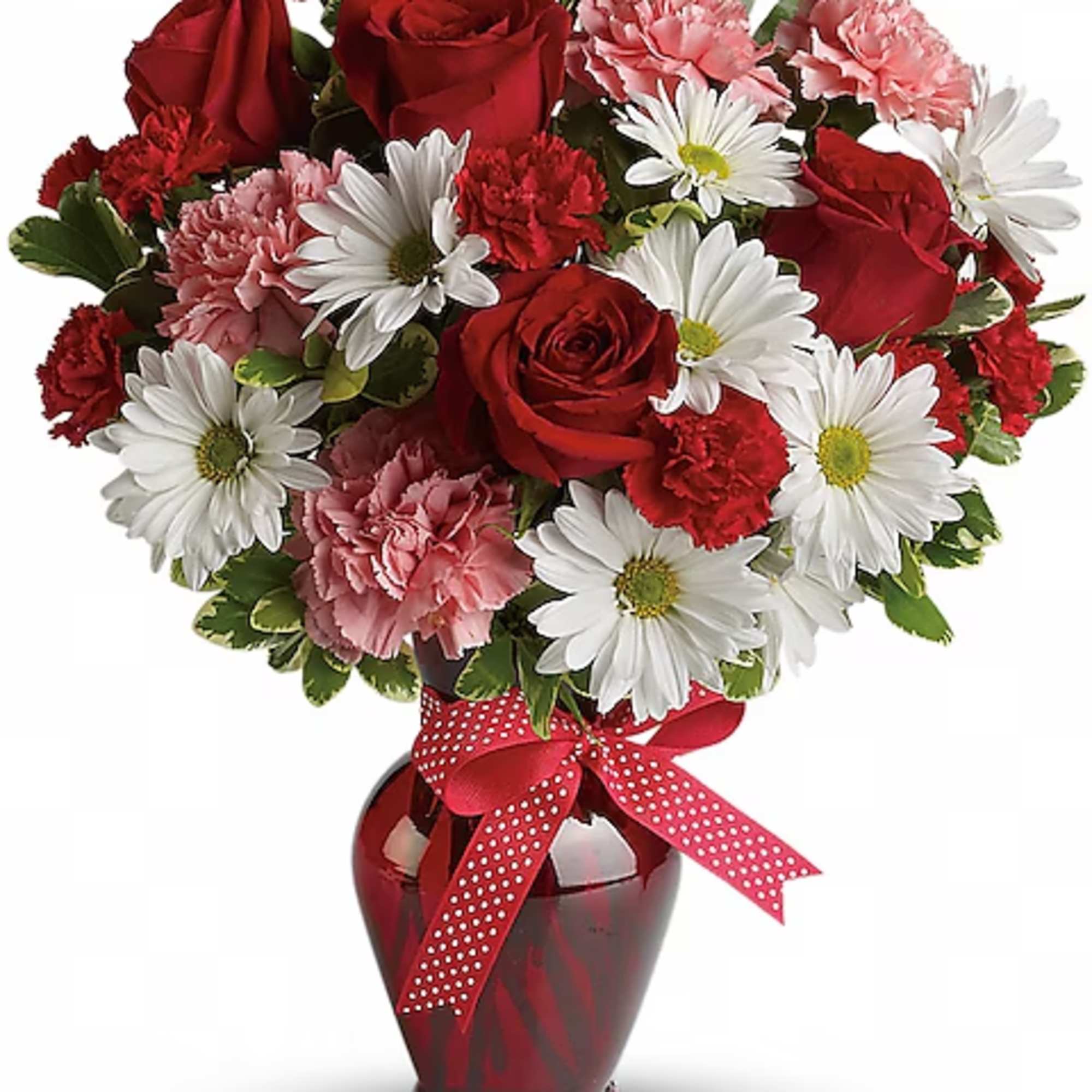 Red roses, white daisies, and pink carnations in a red vase with a ribbon