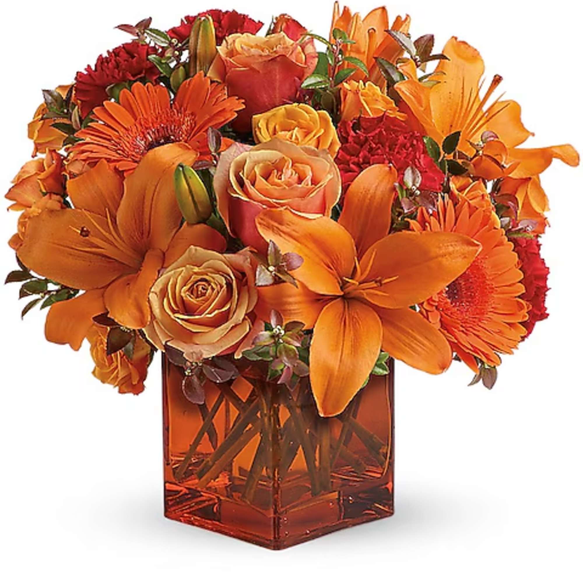 Orange and red bouquet in a square glass vase