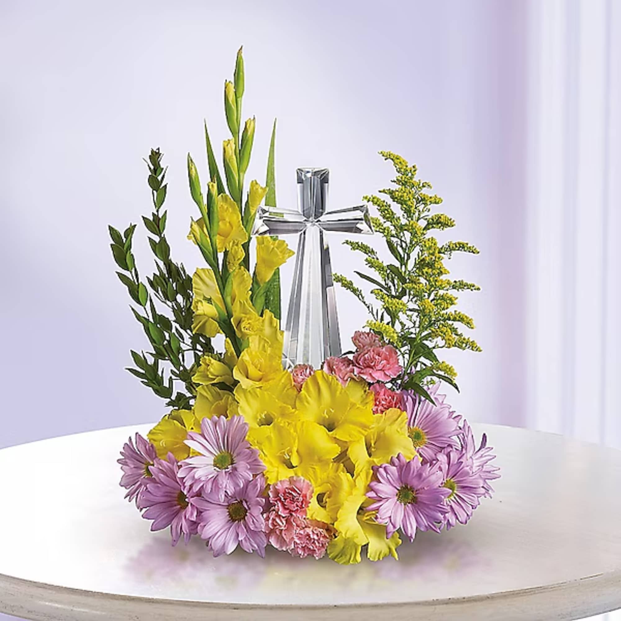 Yellow and lavender floral arrangement with a silver cross centerpiece, photo 2 of 2
