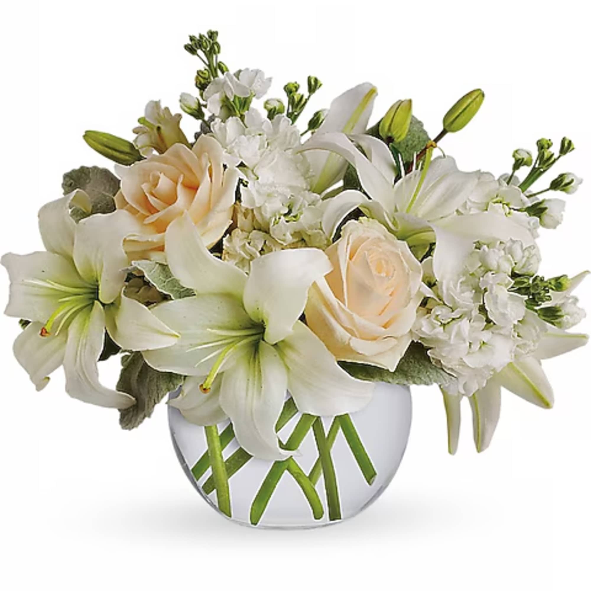 White lilies and cream roses in a round glass vase