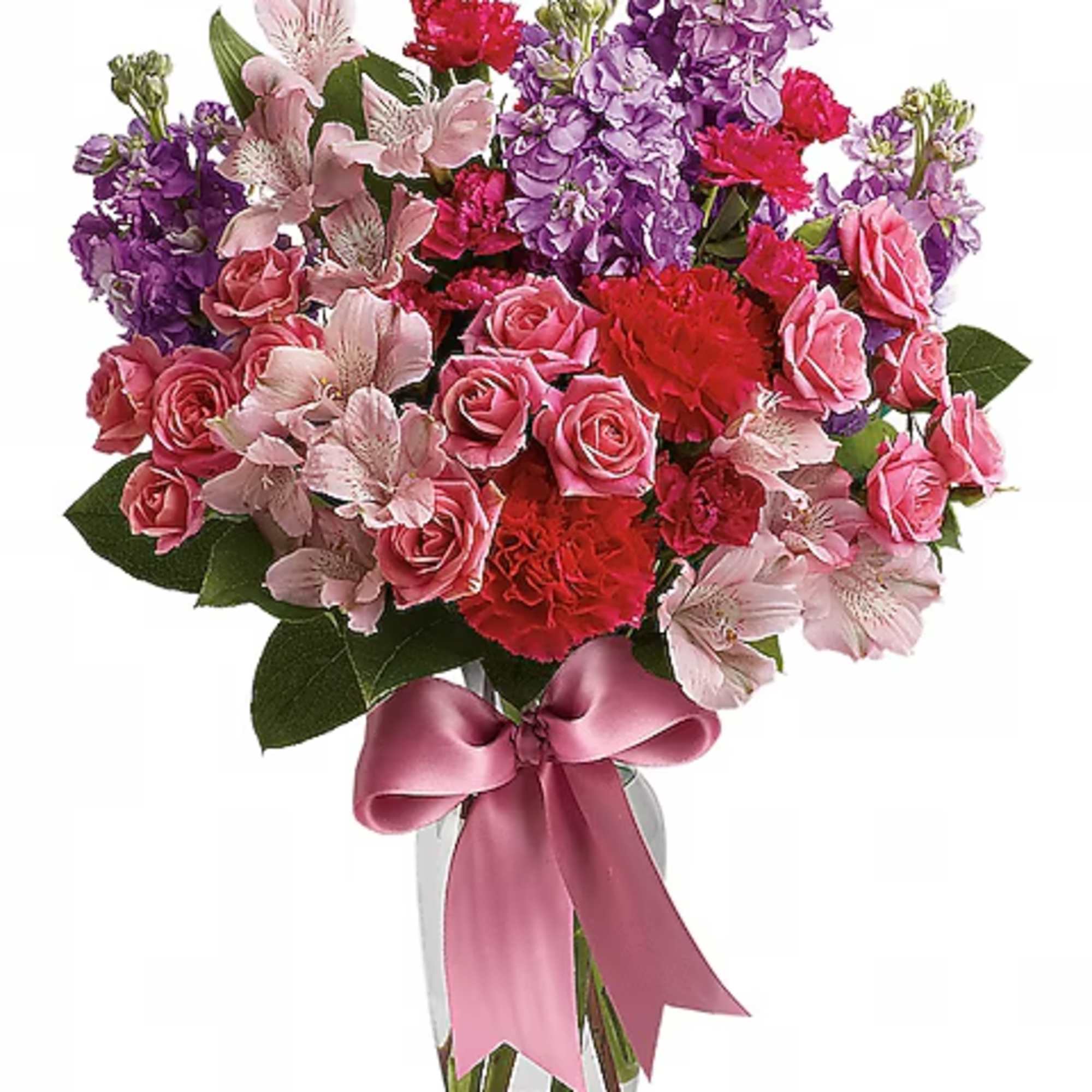 Pink and purple mixed bouquet in a clear glass vase with a pink ribbon