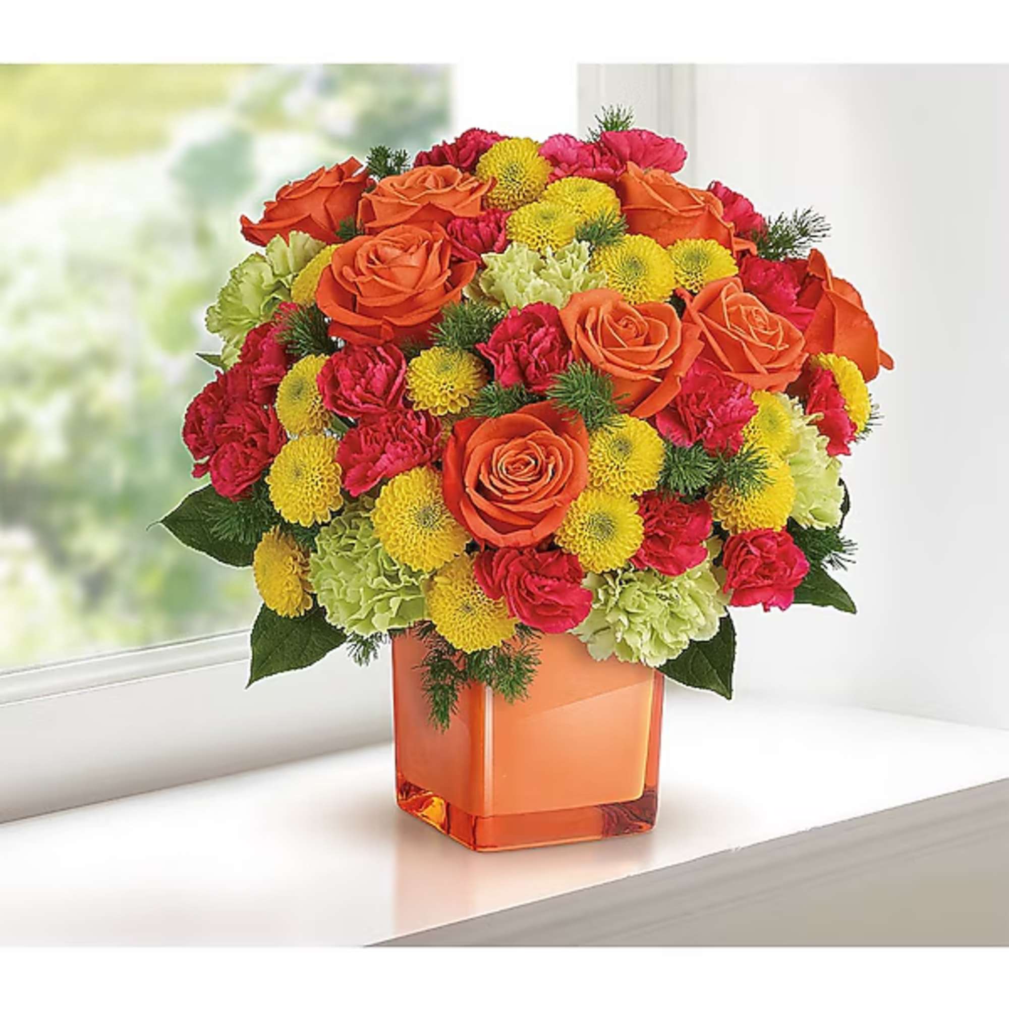 Orange roses and yellow pompons in a square orange vase