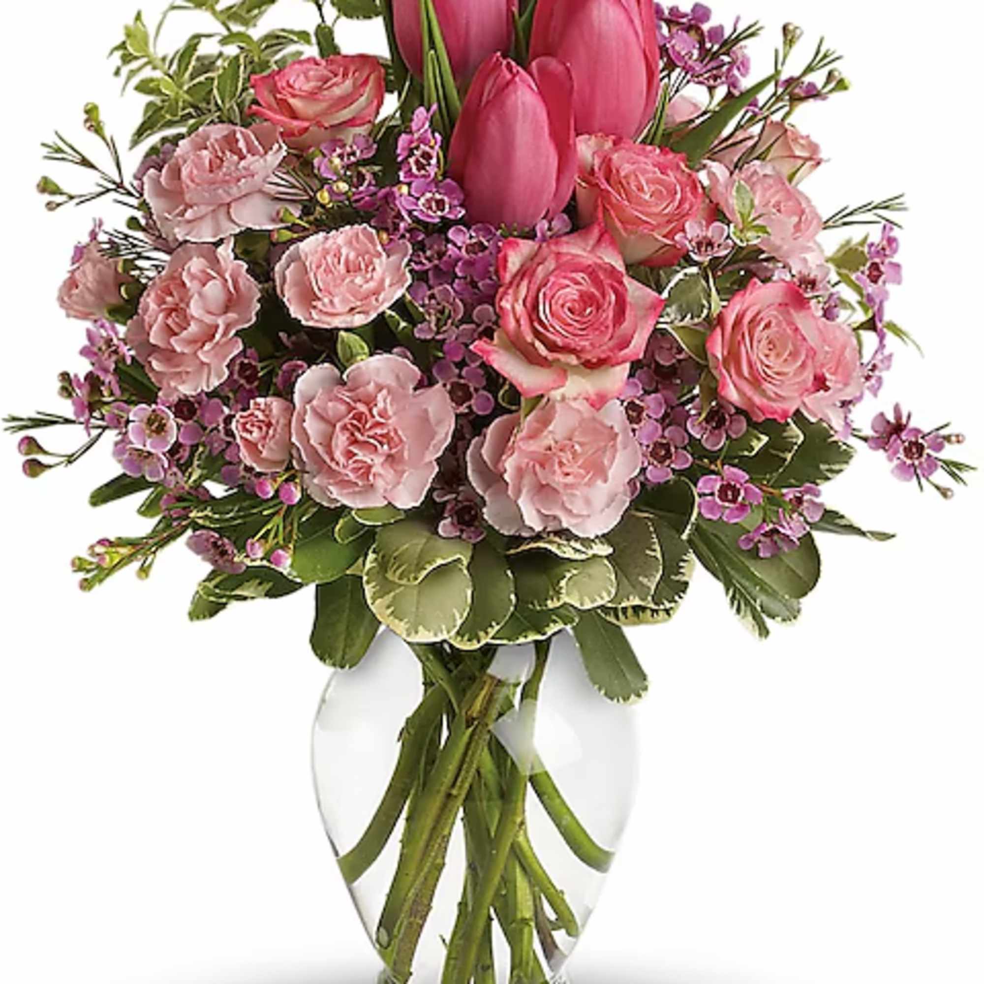 Pink tulips and roses arranged in a clear glass vase, photo 2 of 2