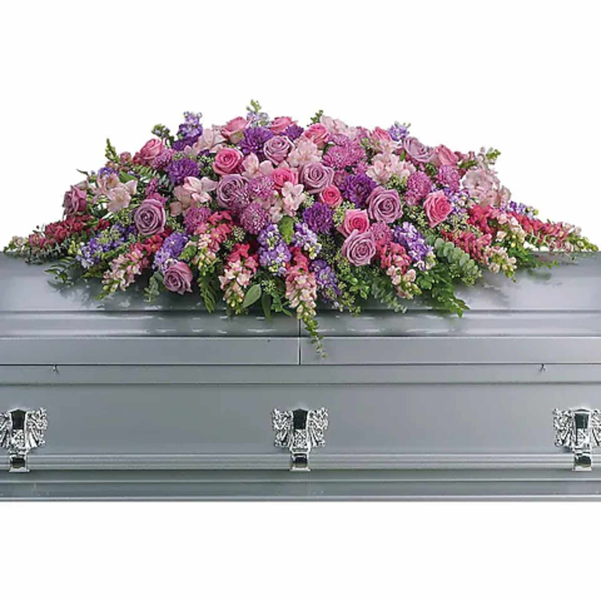 Large pink and purple floral casket spray on a gray casket