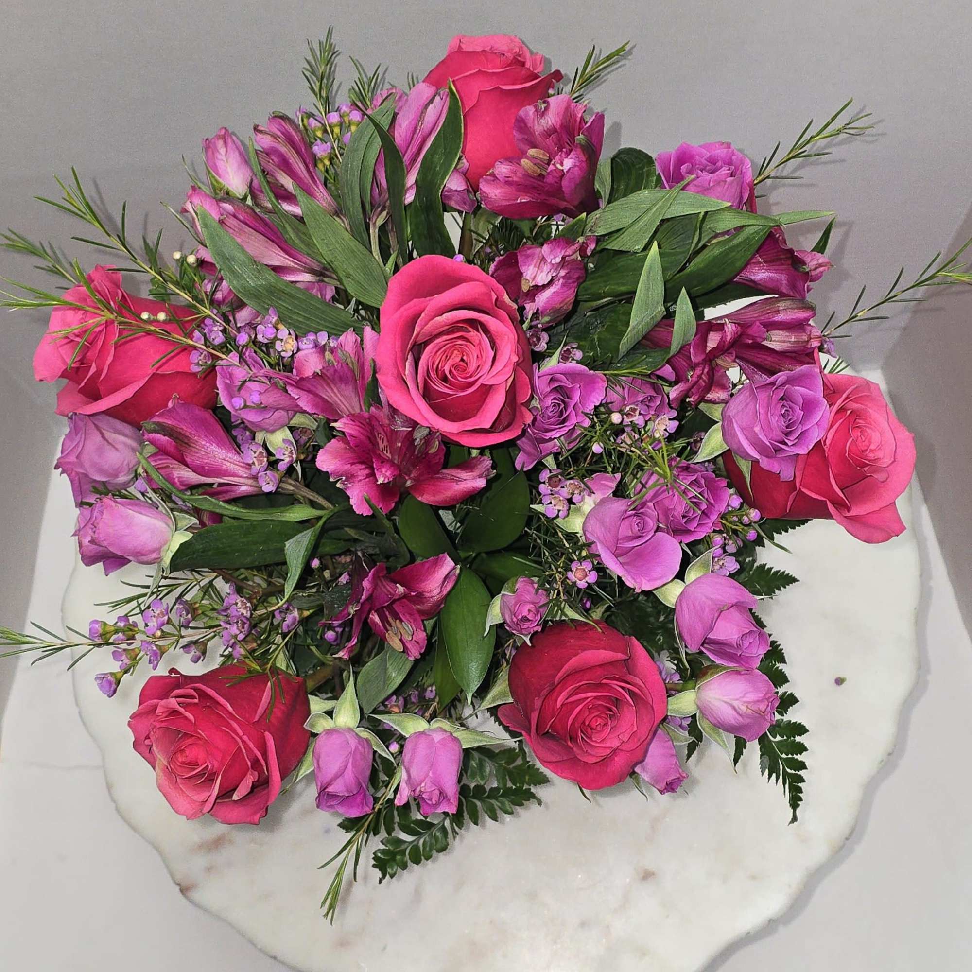 A warm hug, this beautiful wonderful arrangement with warm colors perfect for
