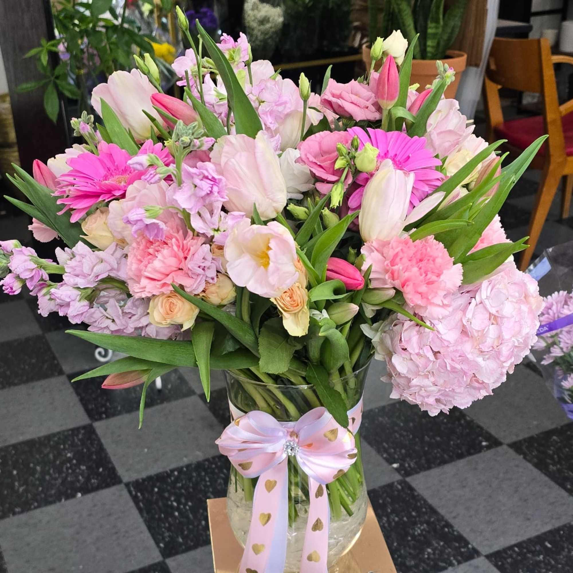 Bright layers of pink and cream make this bouquet feel like a, photo 2 of 2