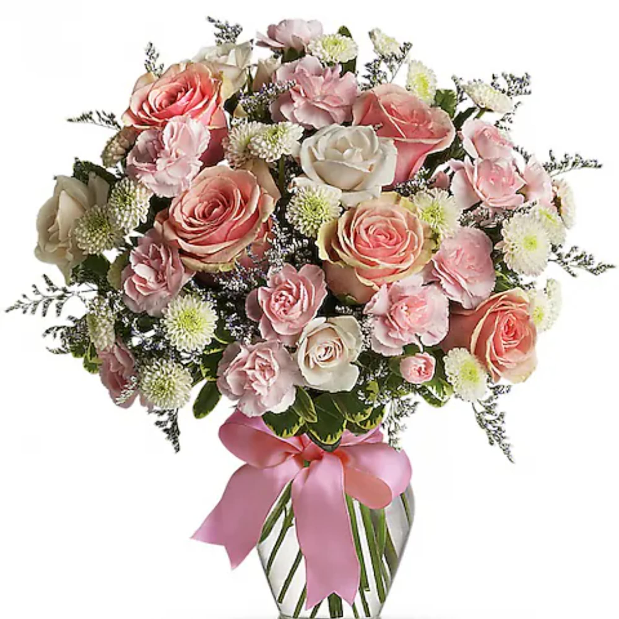 Pink and white rose bouquet with a pink ribbon in a striped vase