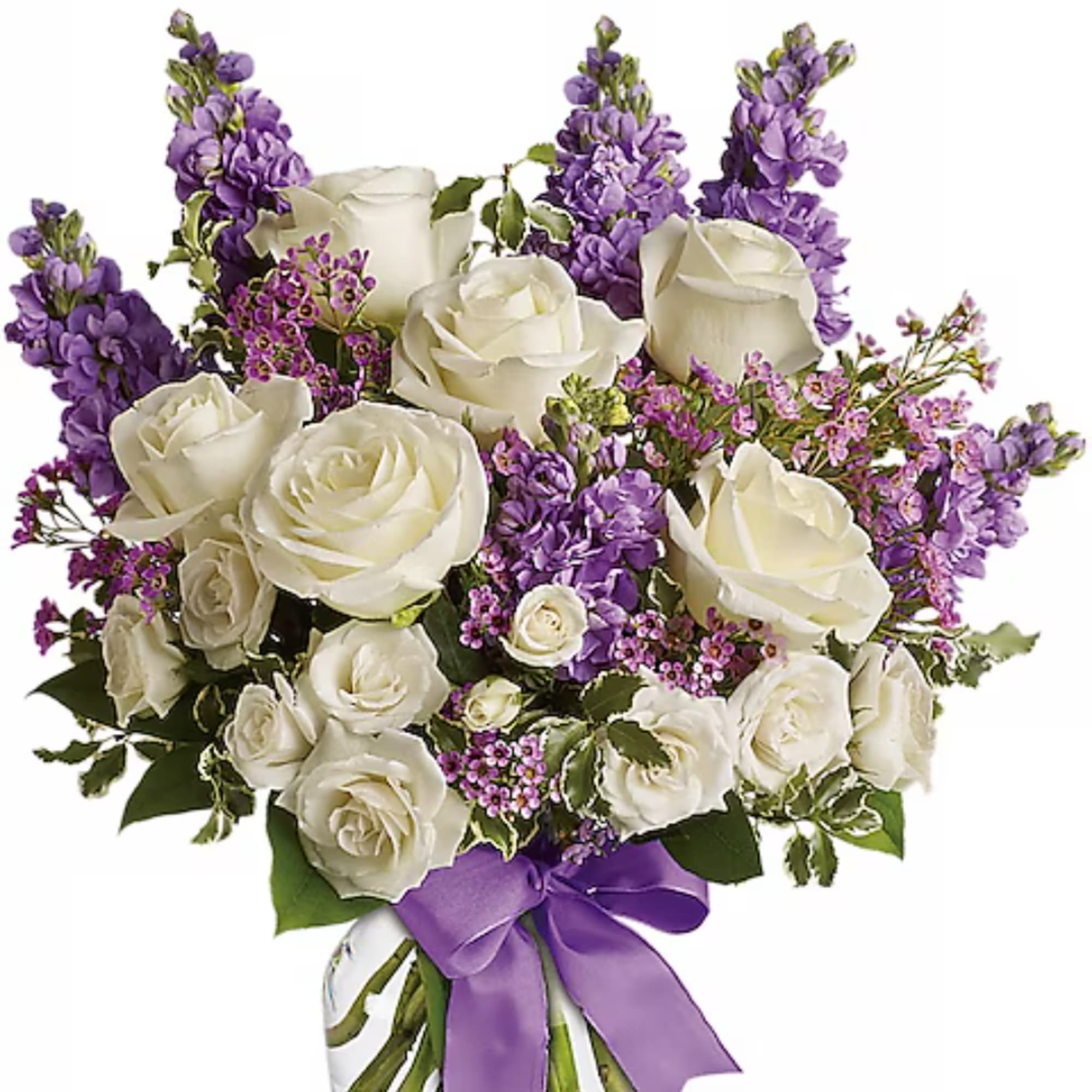 White roses and purple flowers arranged in a bouquet with a purple ribbon